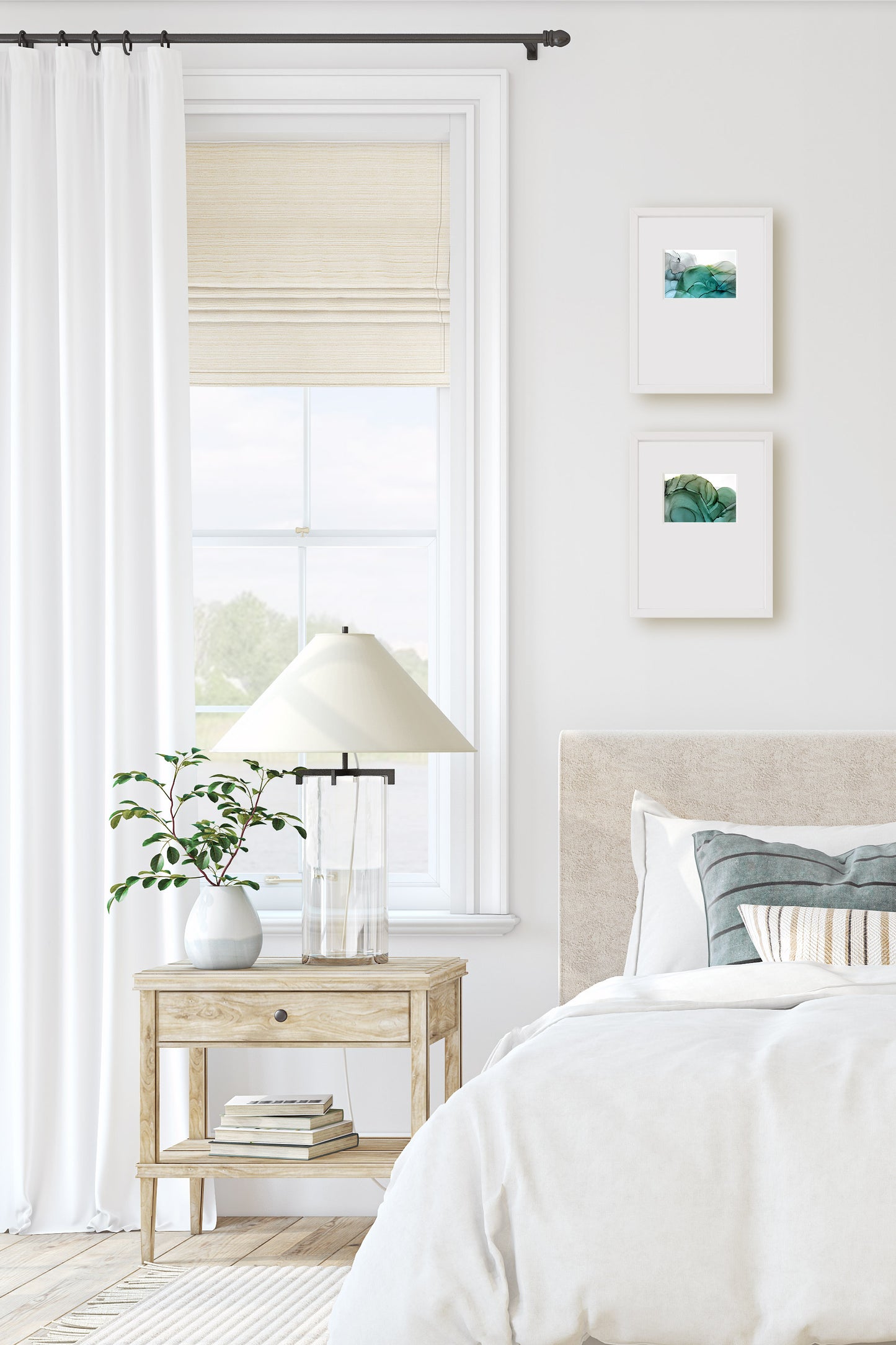 Digital mockup of two paintings hung on a light grey bedroom wall next to a window and night stand and above the bed.
