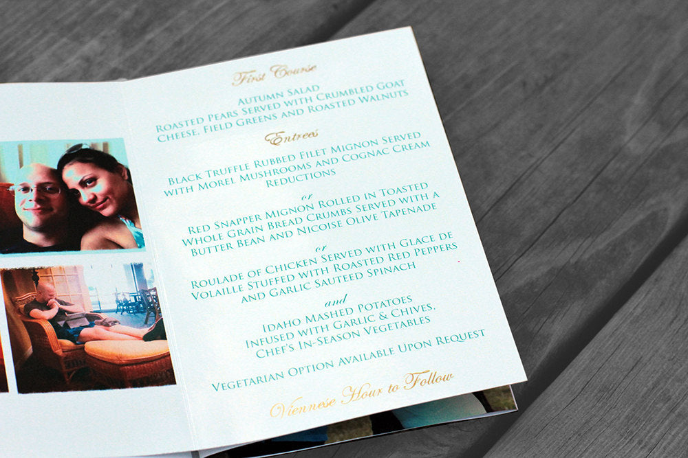 Centerpiece laying on wooden boards. The panels show family photos and menu details.