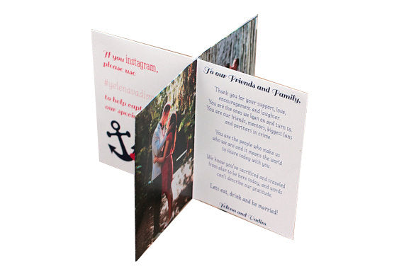 Centerpiece standing on a white background. The panels show social media hashtag instructions along with an anchor and heart icon, an engagement photo of a couple in the woods, and wording thanking their friends and family for attending their special day.