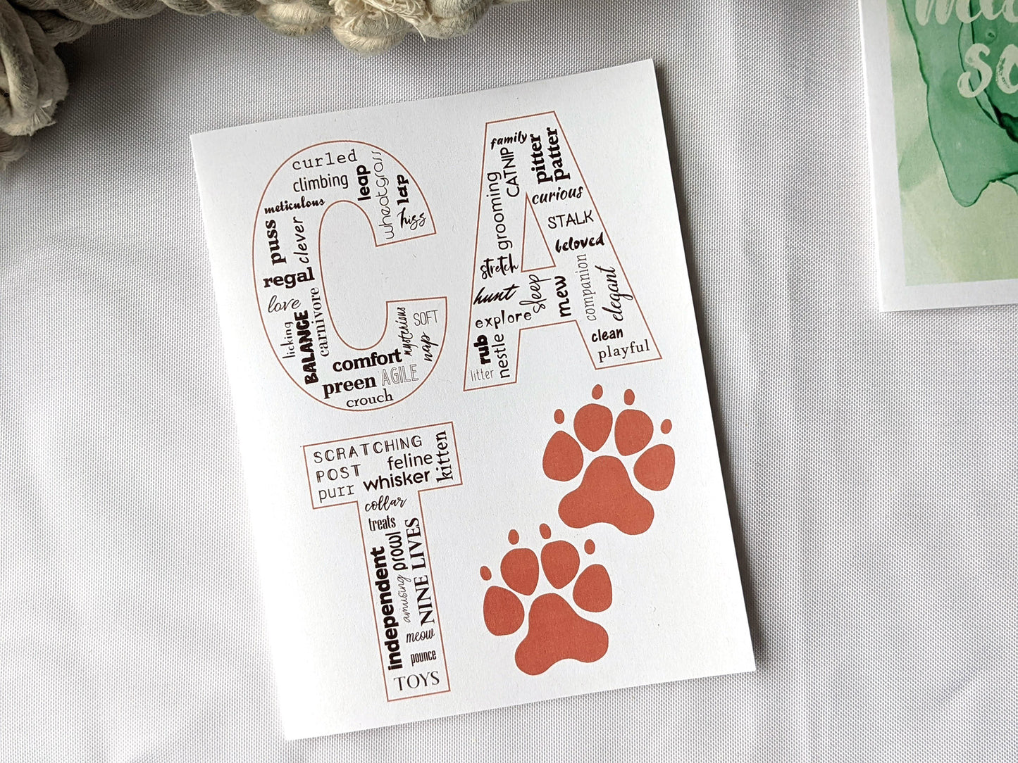 Angled view from above of greeting card next to others from the collection.