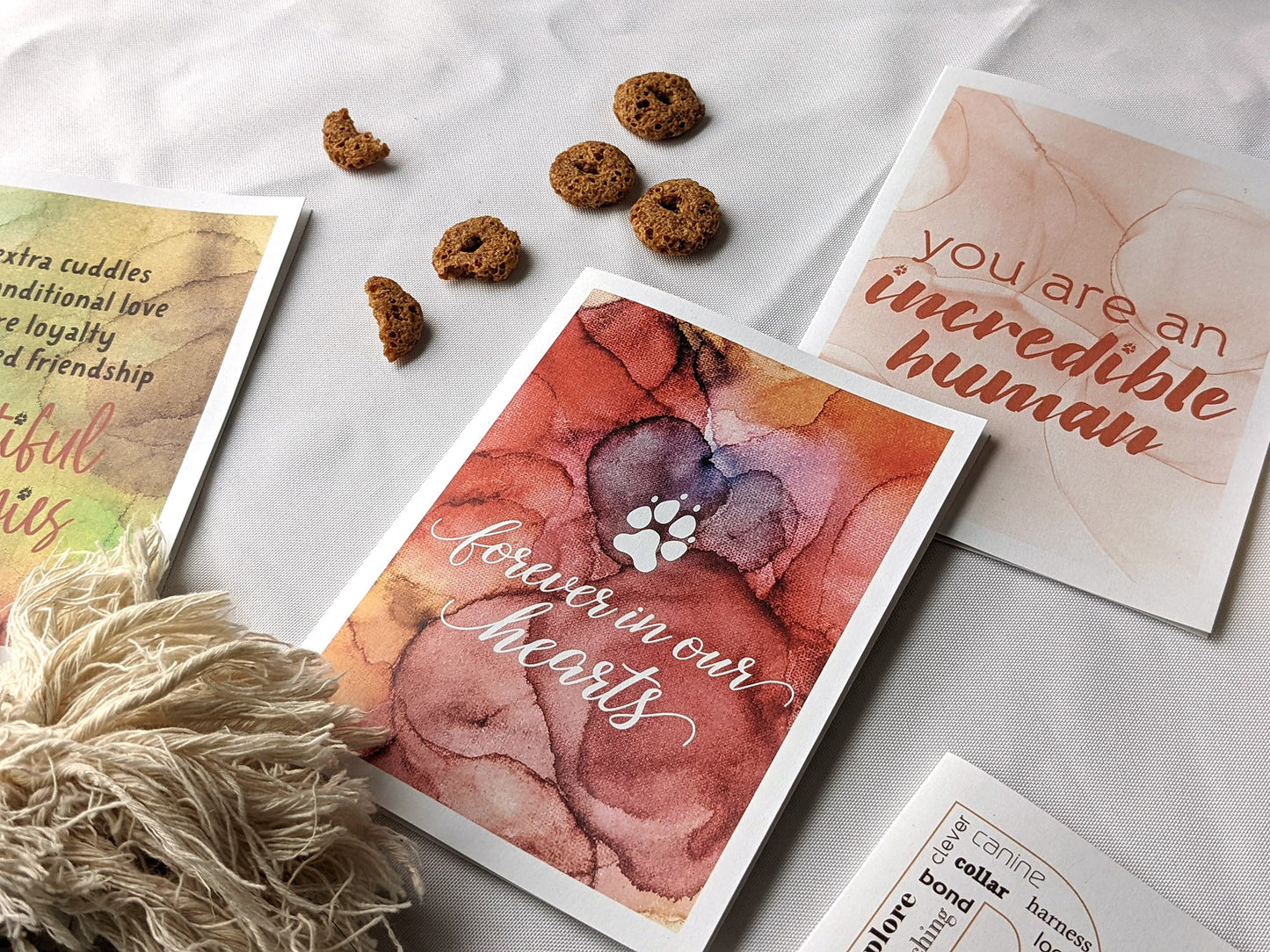 Angled view from above of greeting card next to others from the collection.