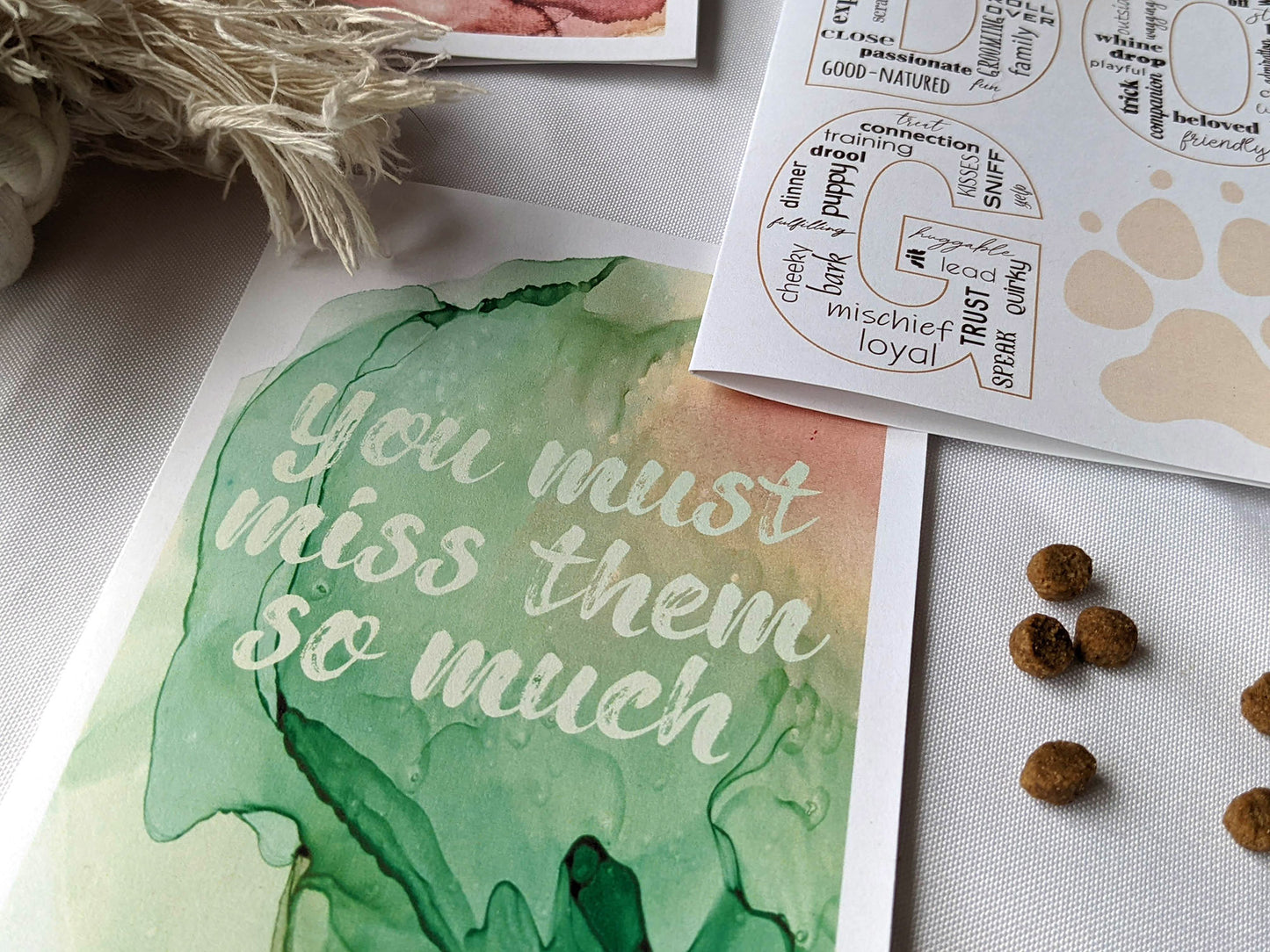 Angled view from above of greeting card next to others from the collection.