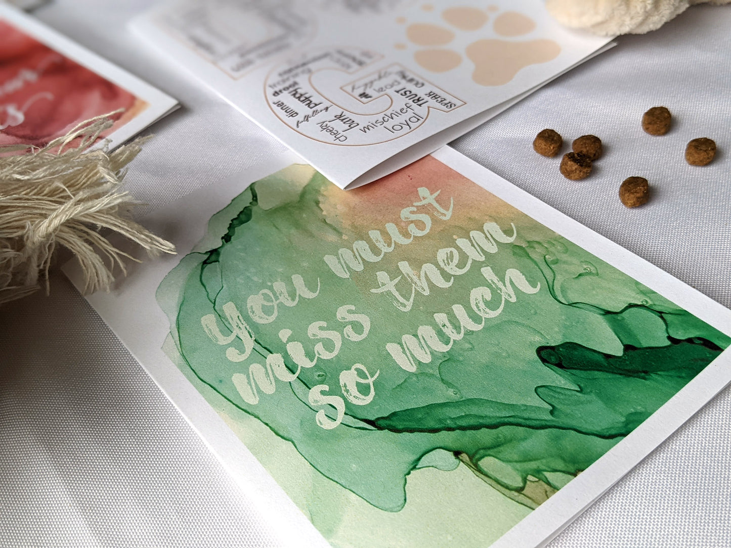 Angled view from above of greeting card next to others from the collection.