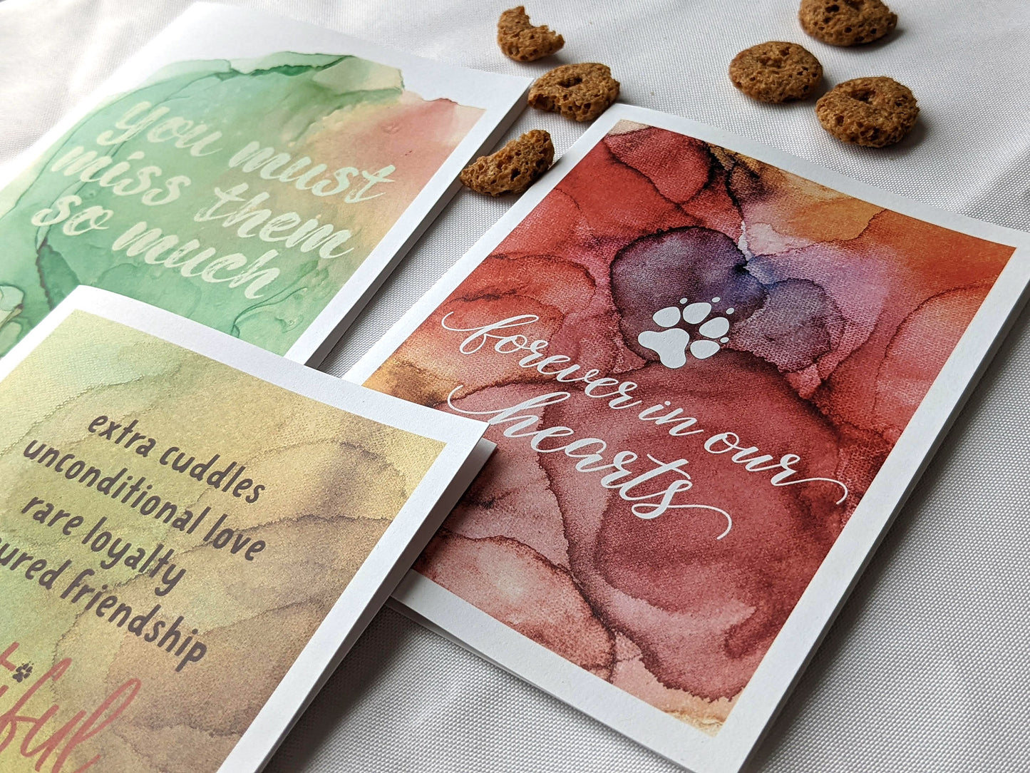 Angled view from above of greeting card next to others from the collection.