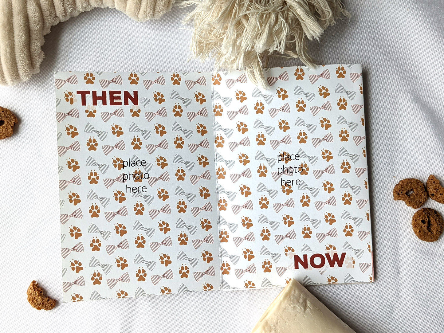 Flatlay of centerpiece showing the graphic design of two panels with dog toys and treats surrounding it.