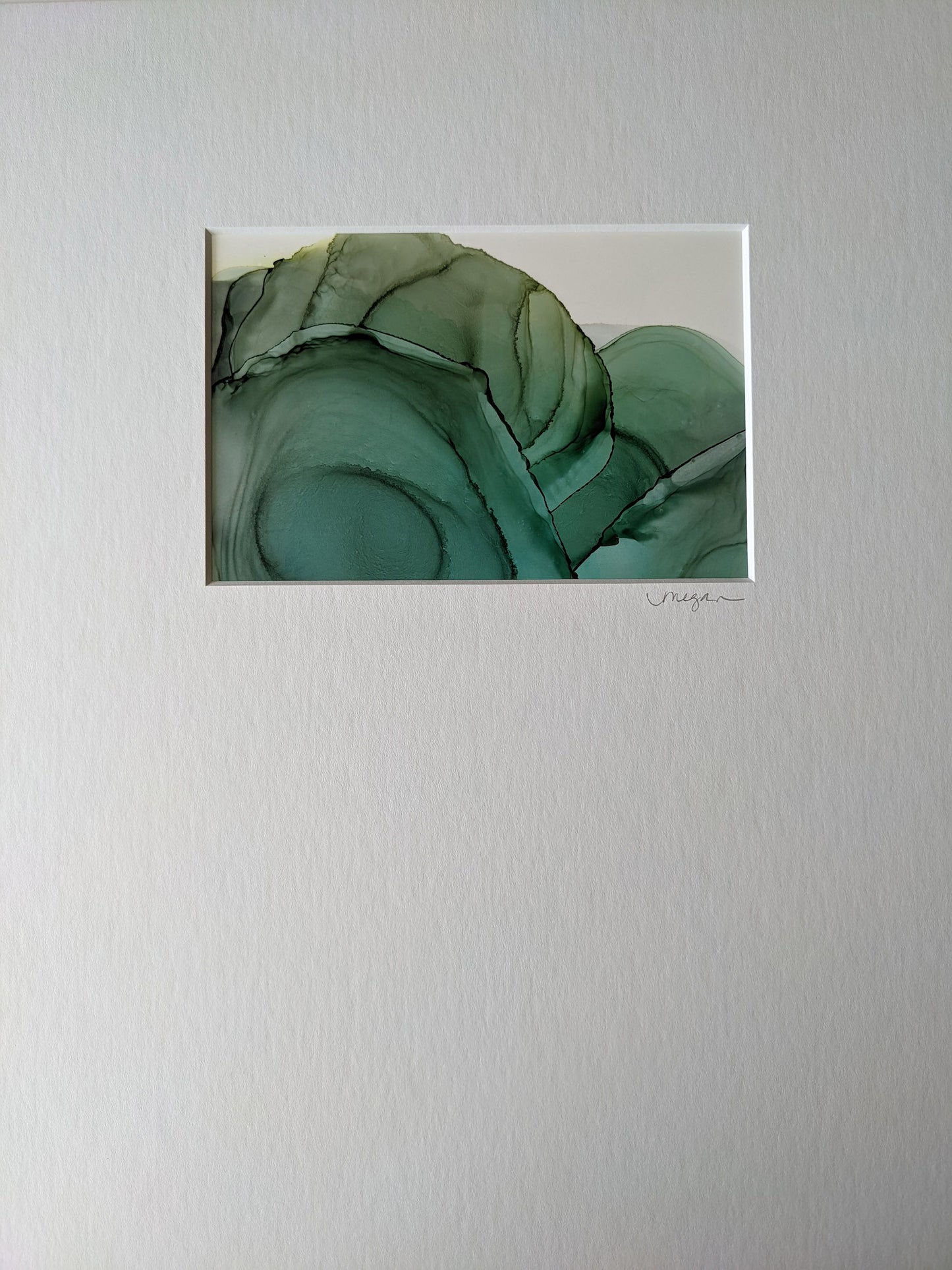 Painting shown with white mat.