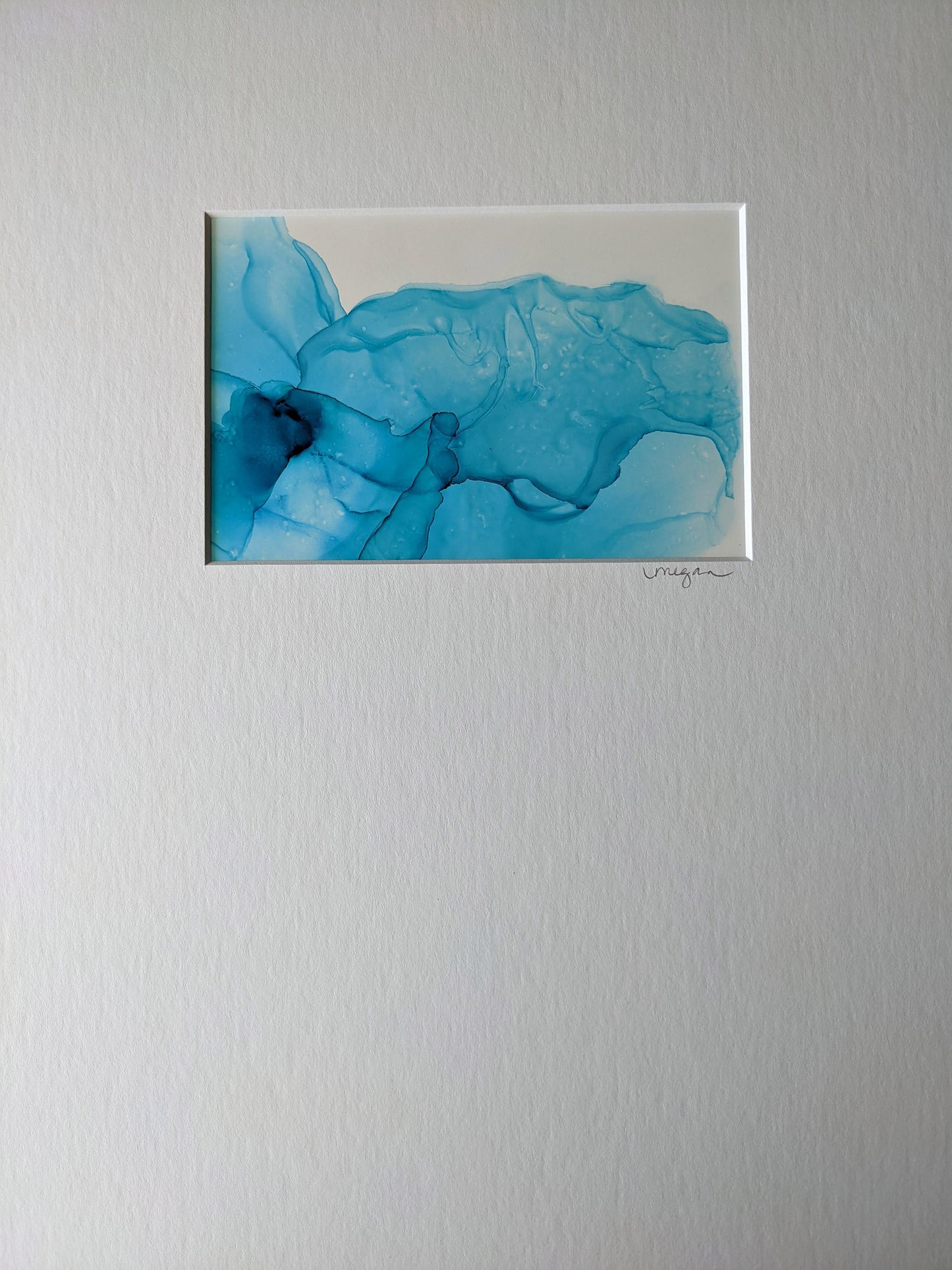 Painting shown with white mat.