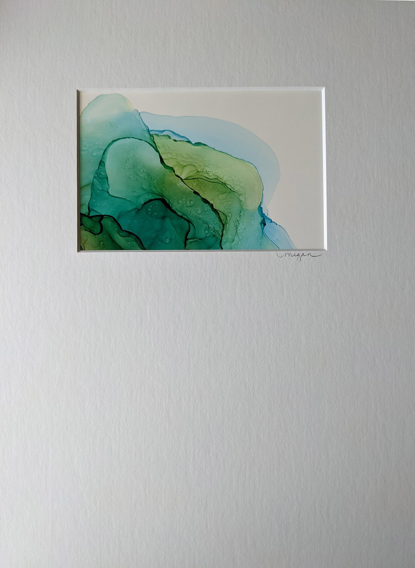 Painting shown with white mat.