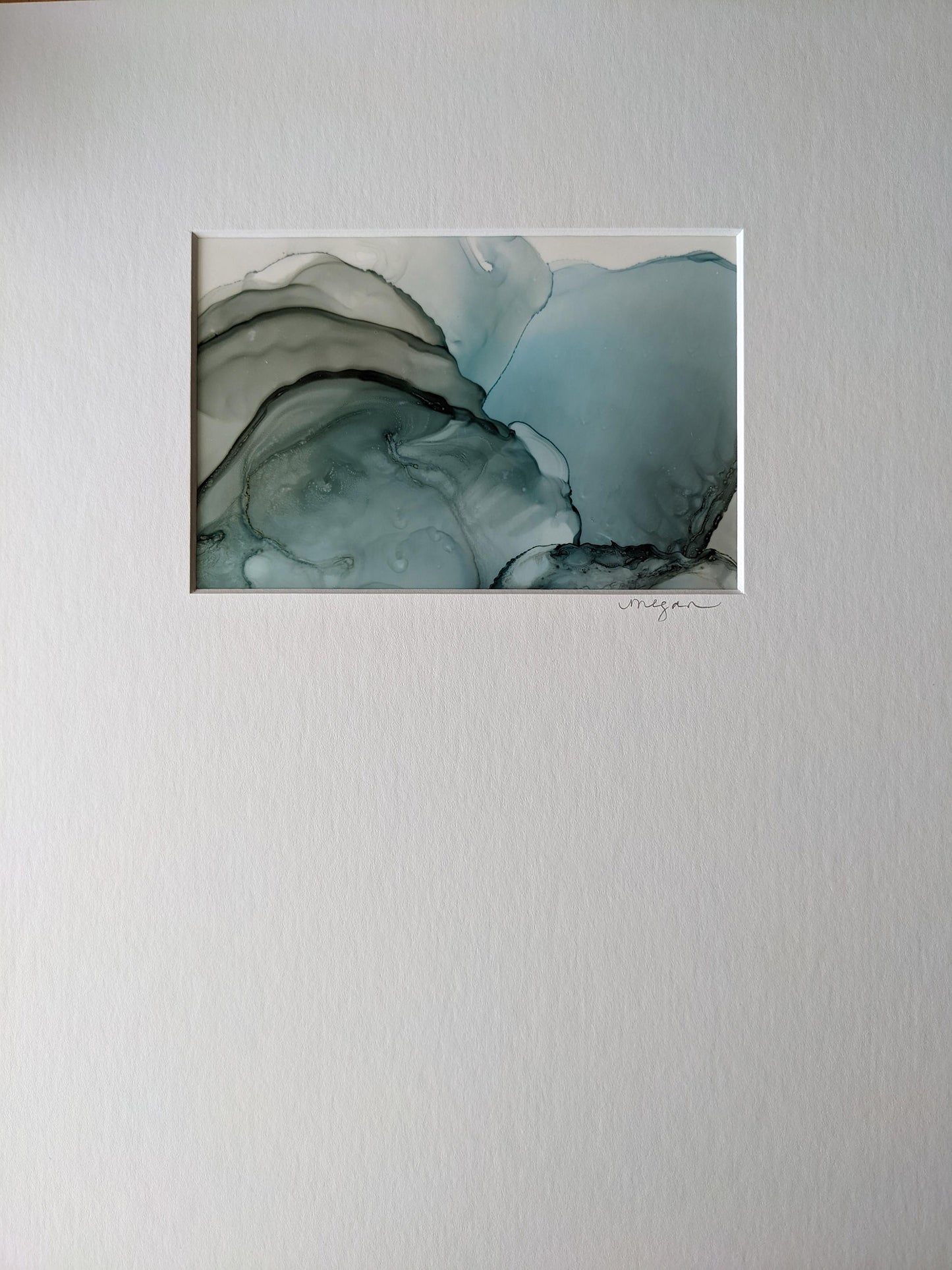 Painting shown with white mat.