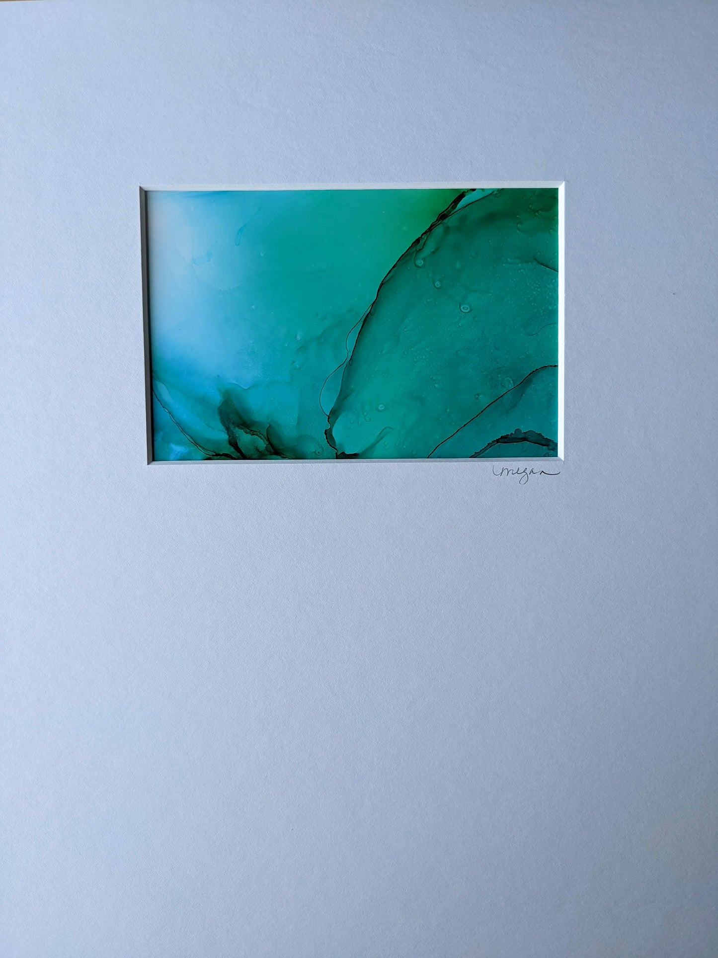 Painting shown with white mat.