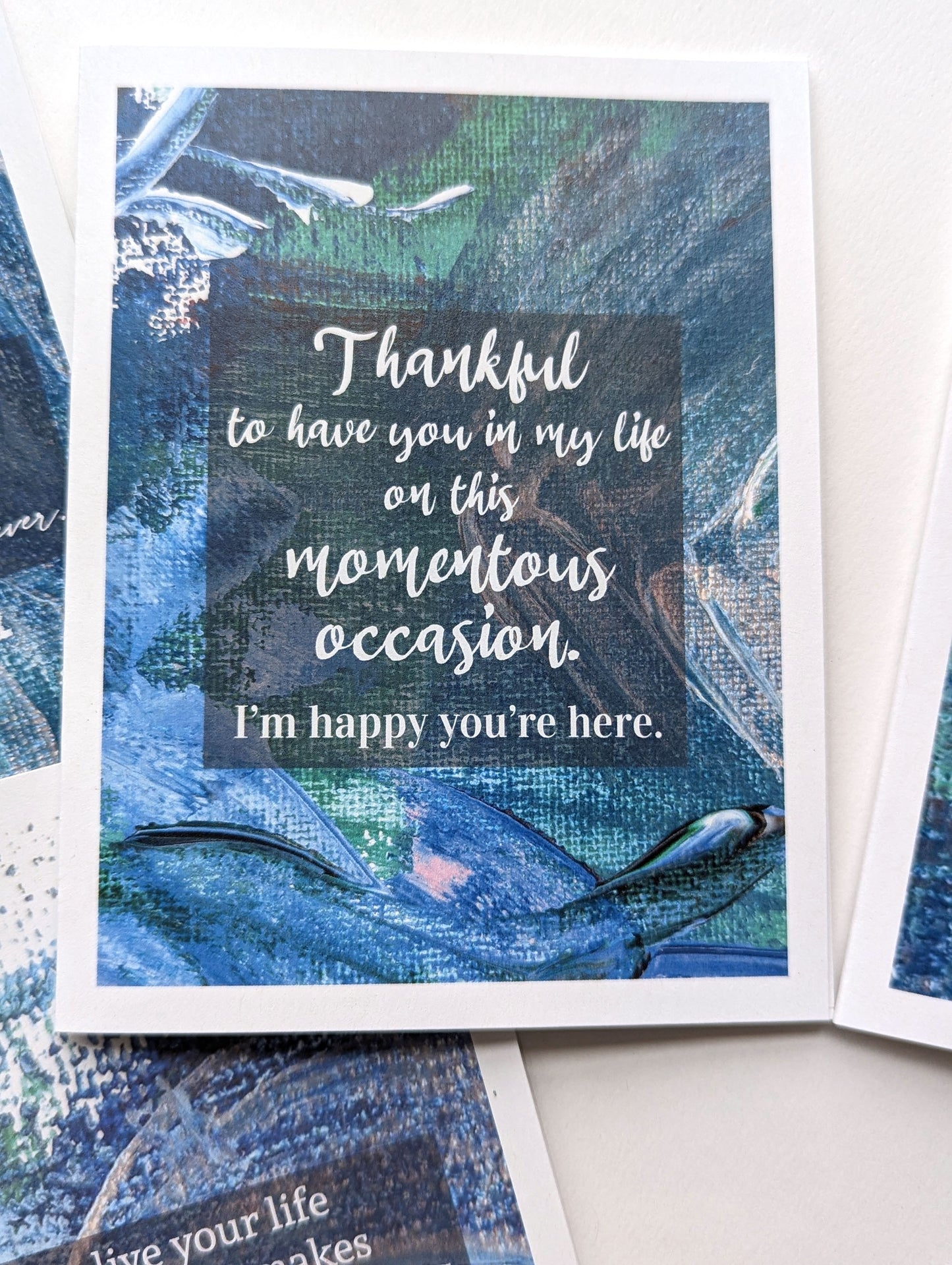 Lifestyle shot with close up of greeting card.