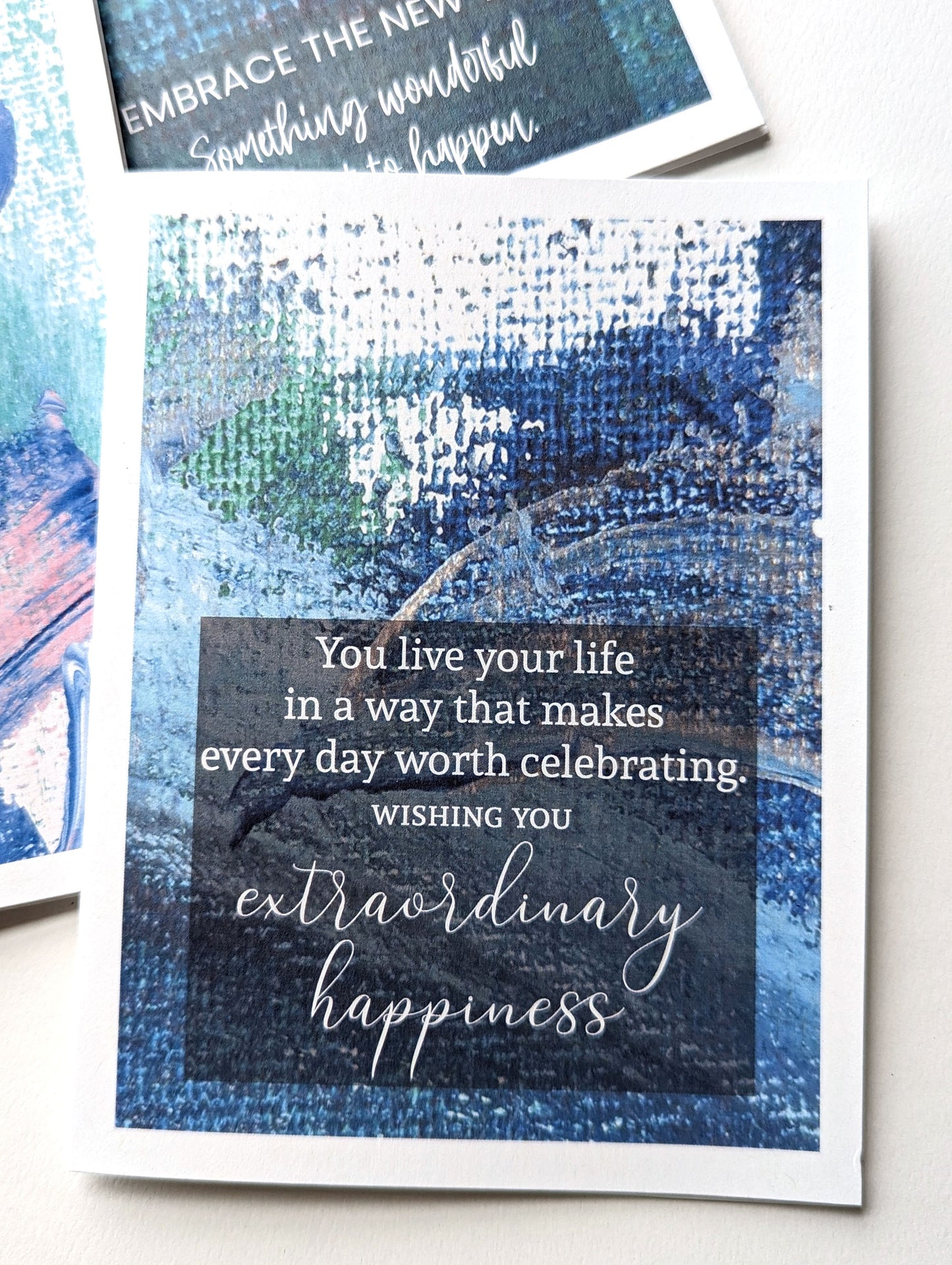Lifestyle shot with close up of greeting card.