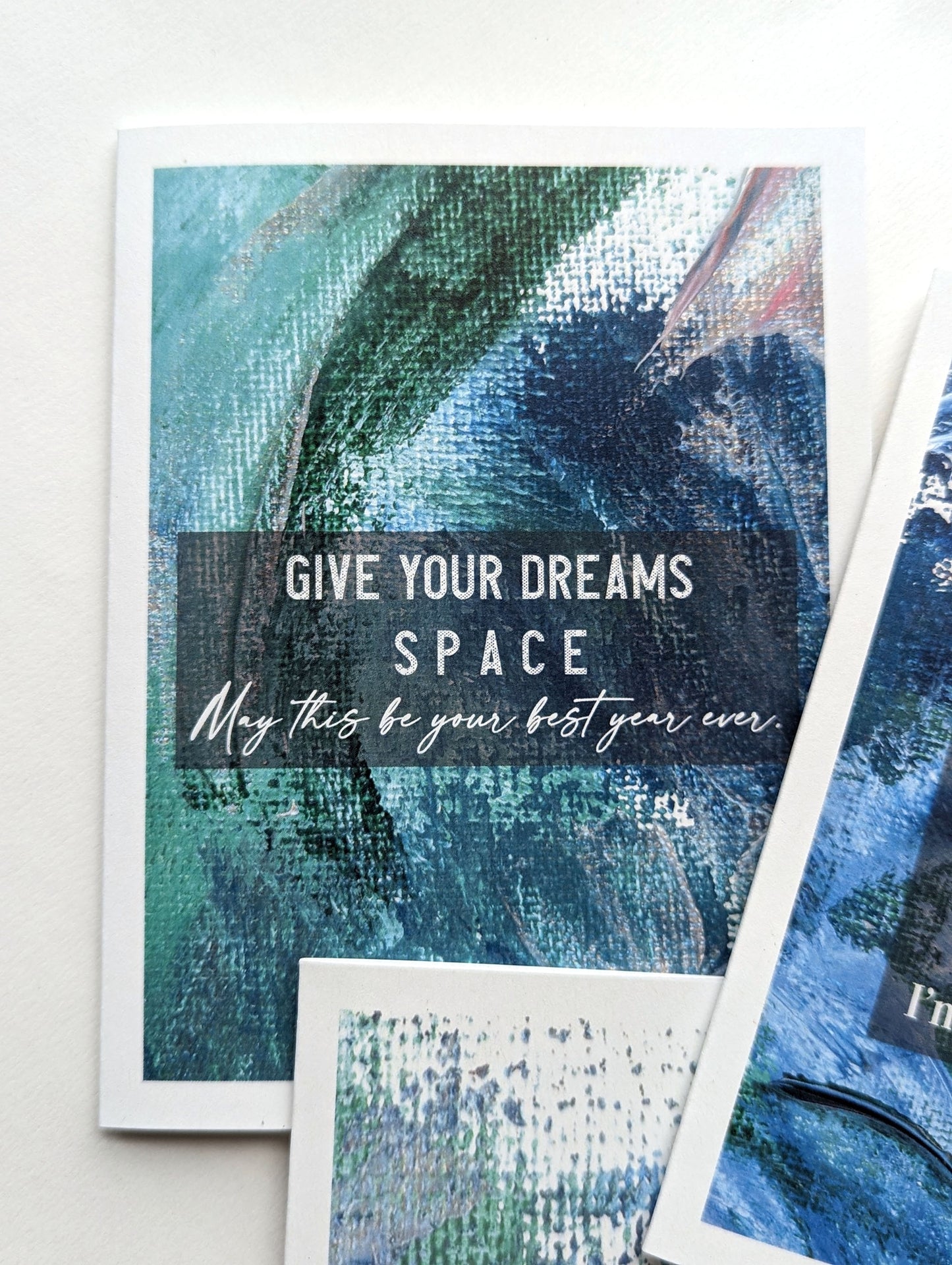 Stack of greeting cards on a white background.