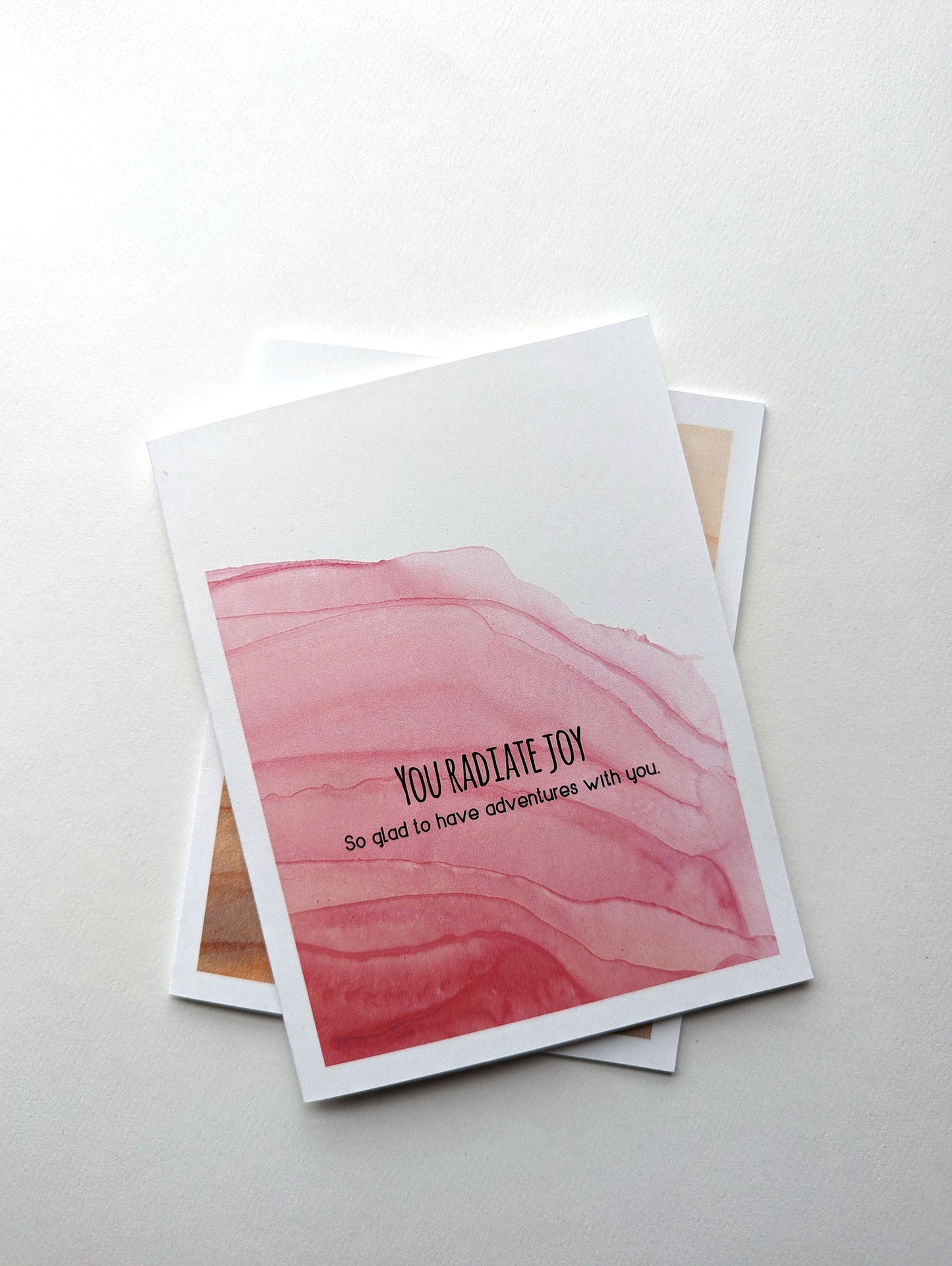 Stack of greeting cards on a white background.