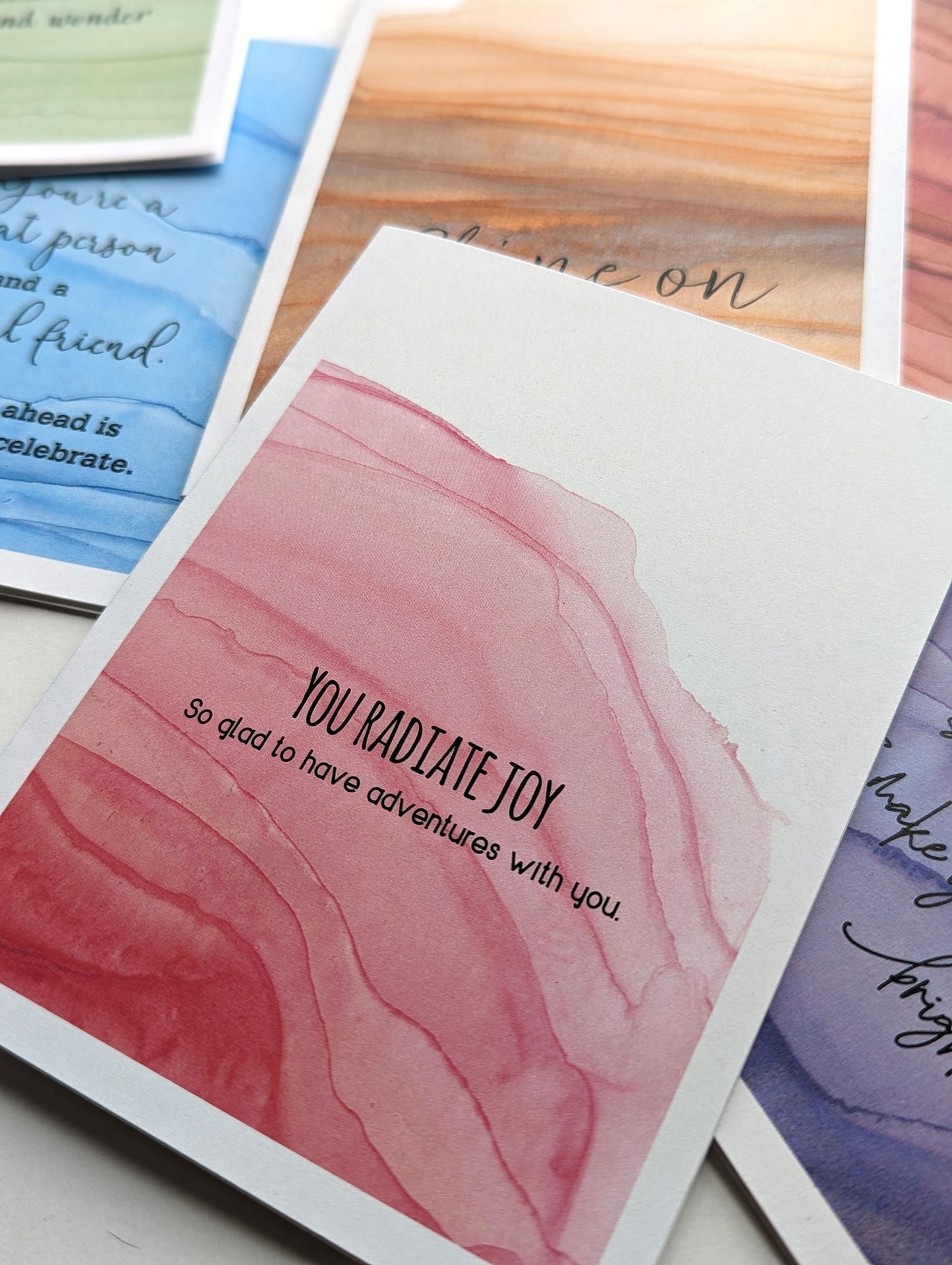 Lifestyle shot with close up of greeting card.