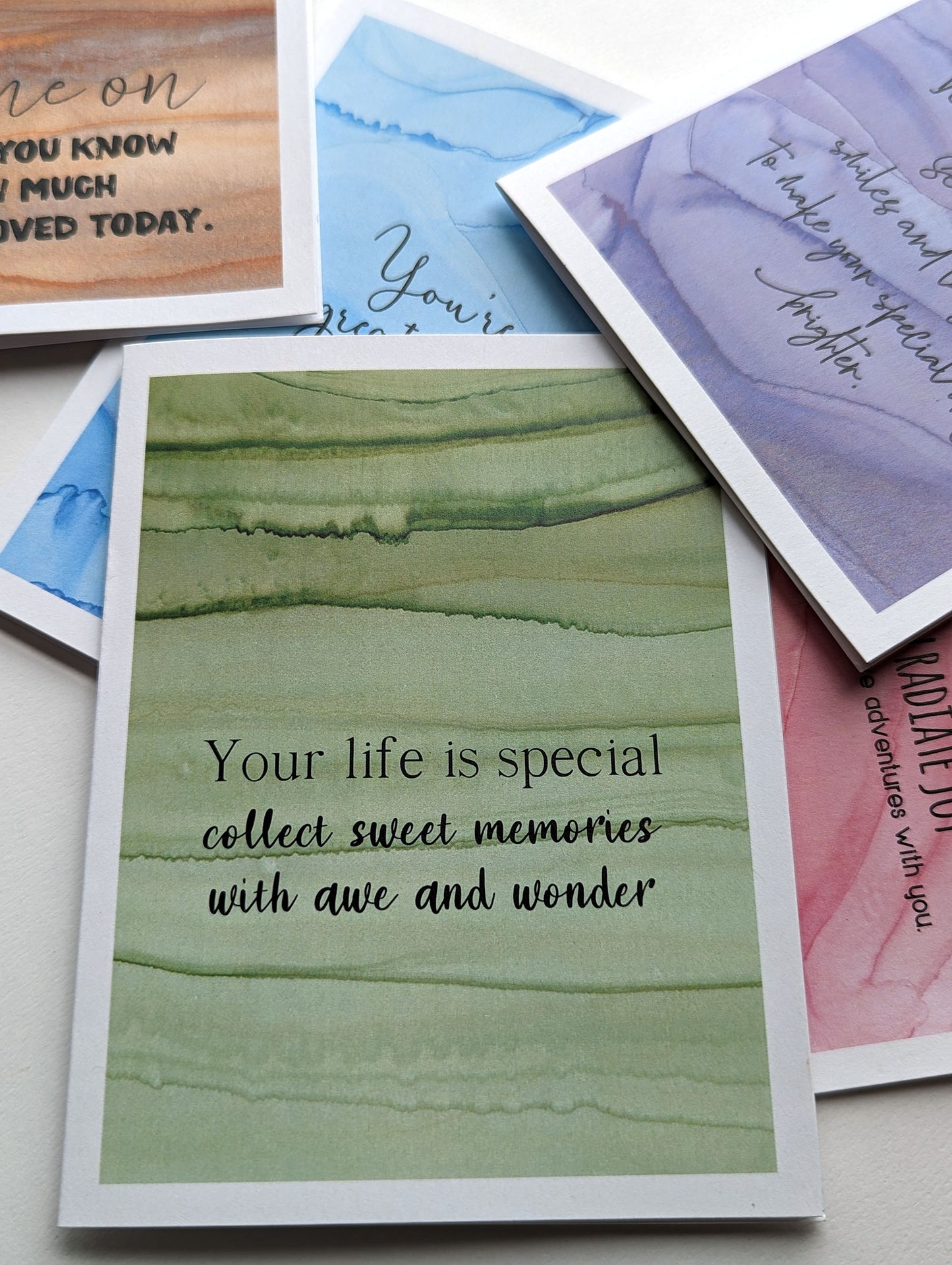 Lifestyle shot with close up of greeting card.