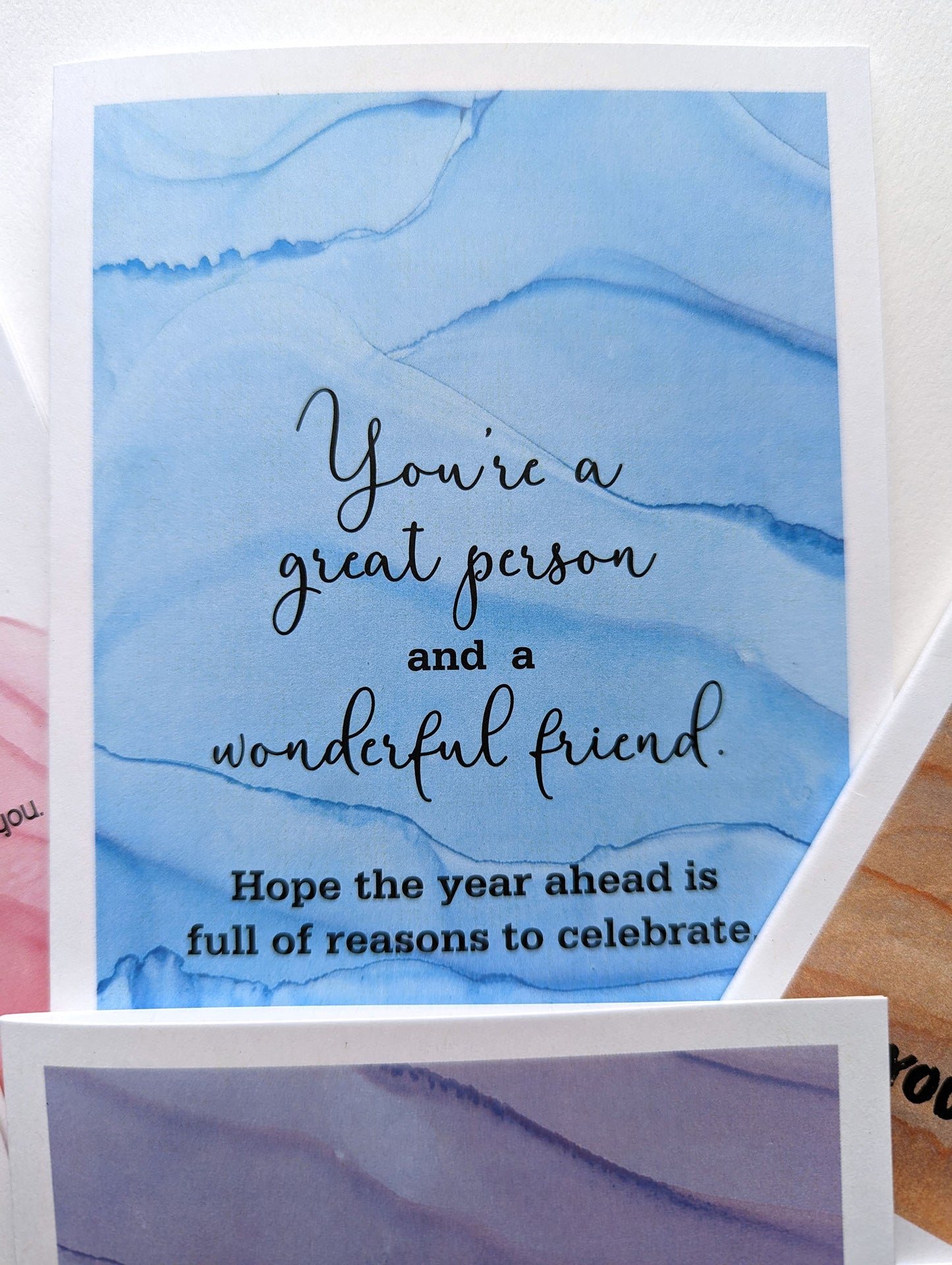 Lifestyle shot with close up of greeting card.