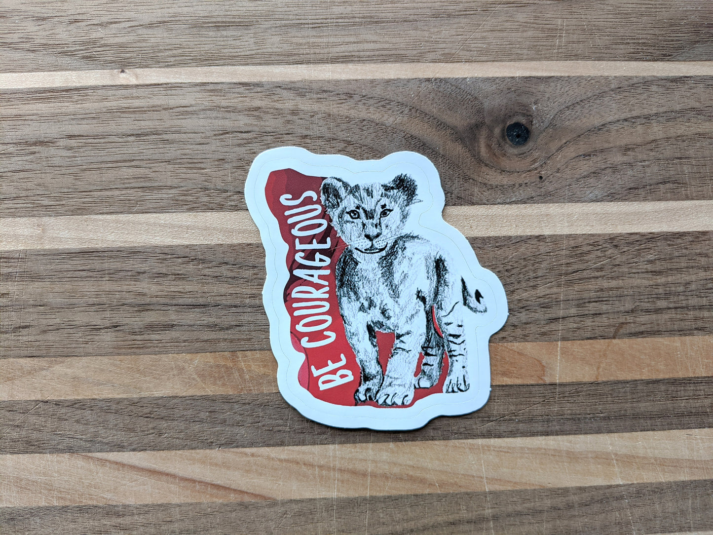 Sticker on a wooden surface.