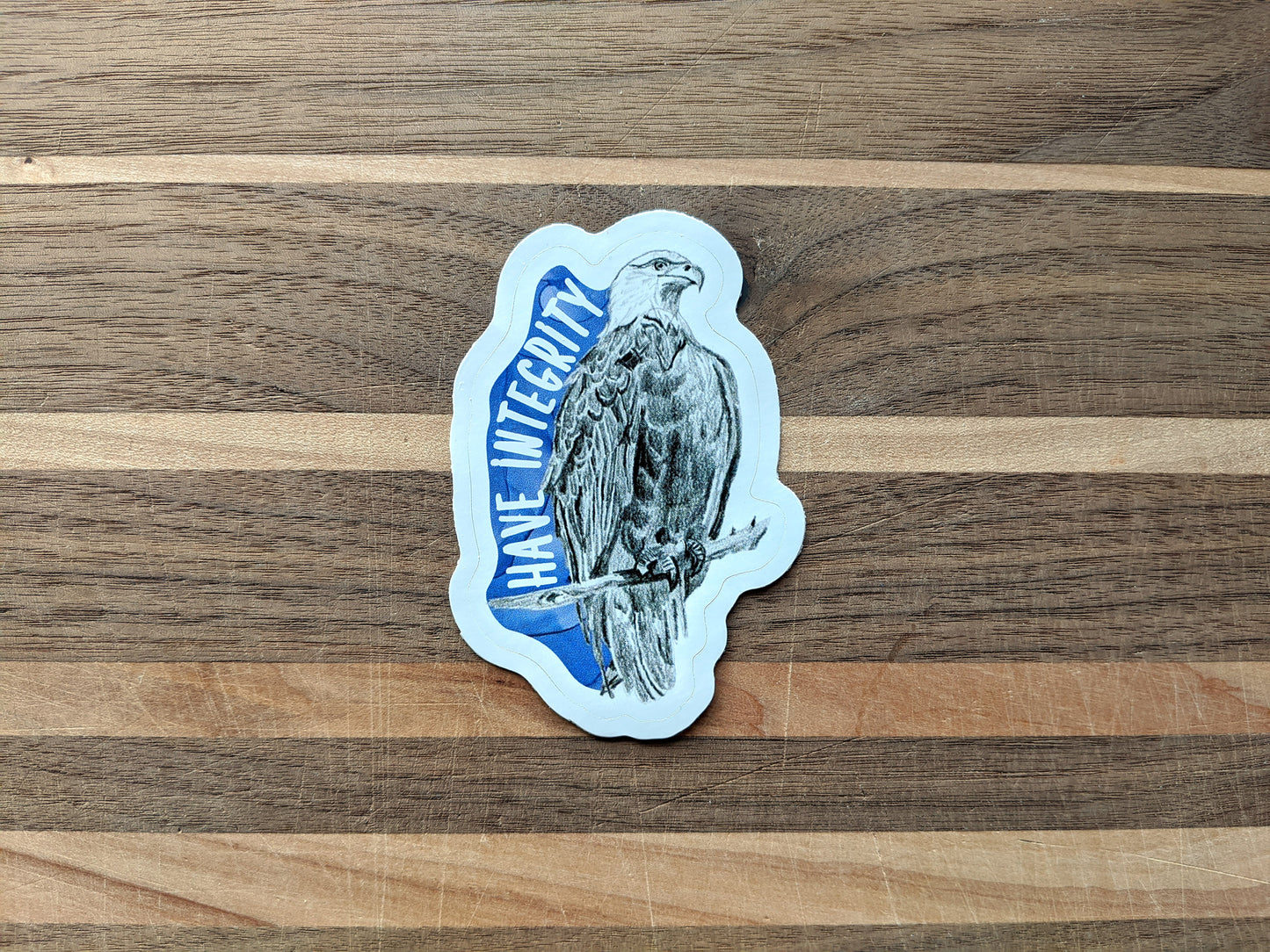 Sticker on a wooden surface.