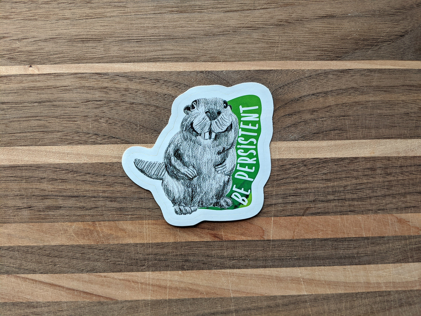 Sticker on a wooden surface.