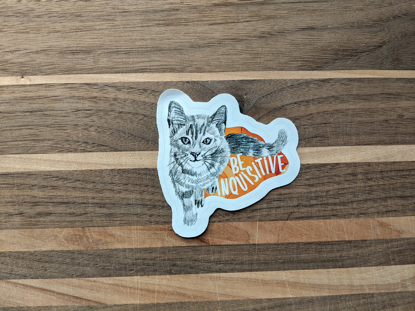Sticker on a wooden surface.