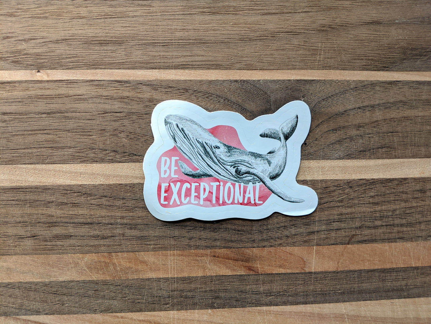 Sticker on a wooden surface.