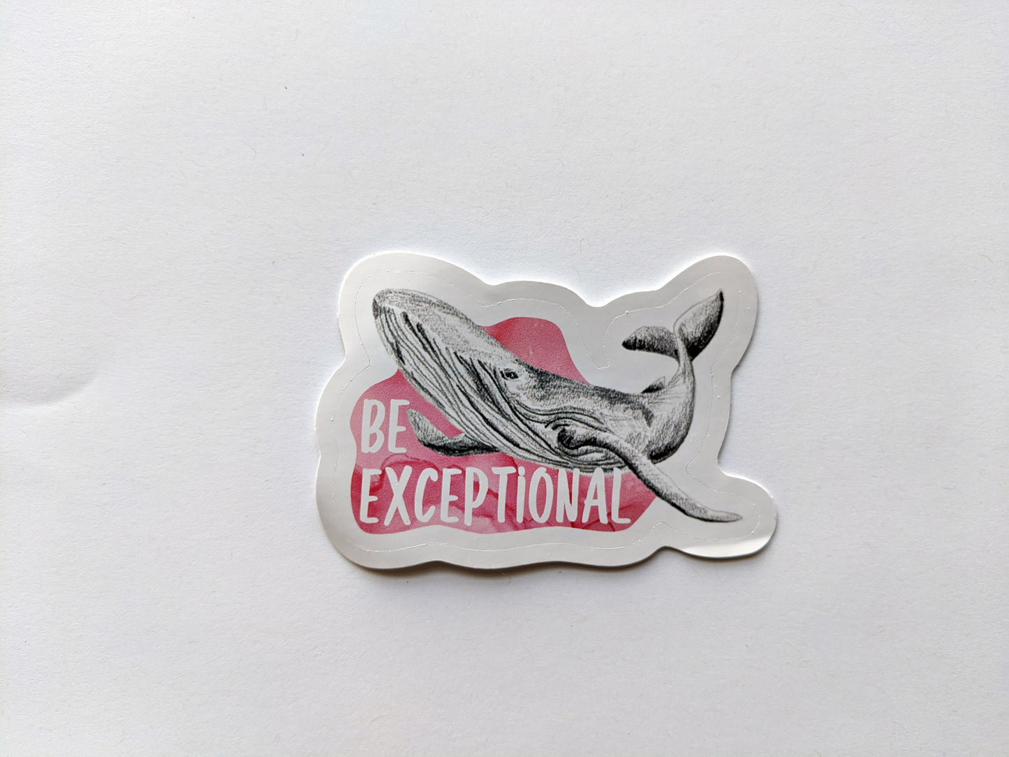 Sticker laying on a white background.