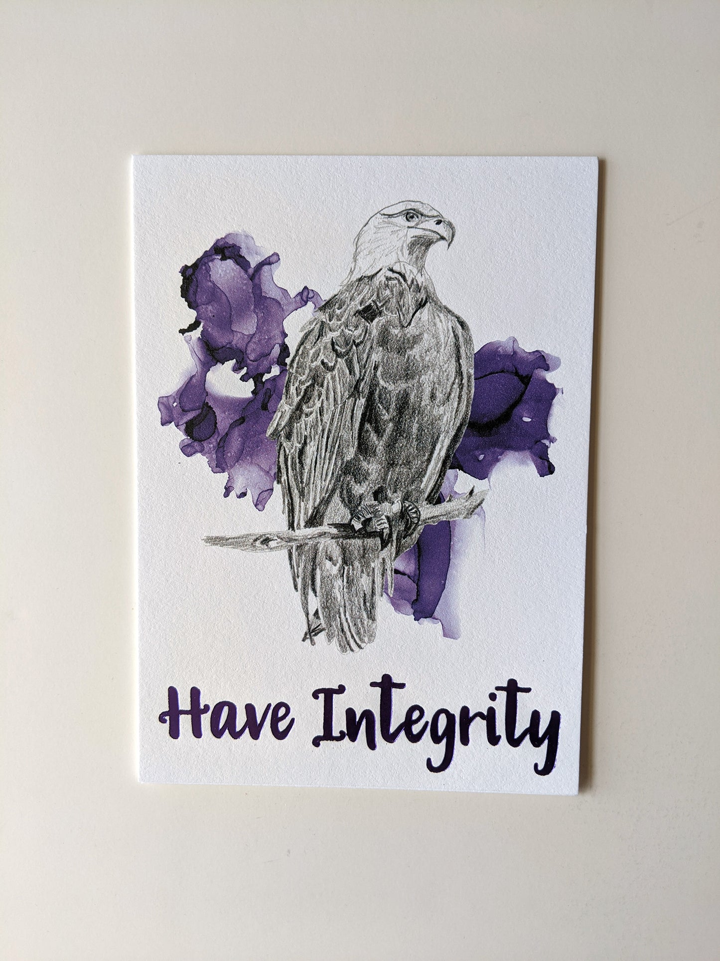 Art print accented in foil laying on a white background.