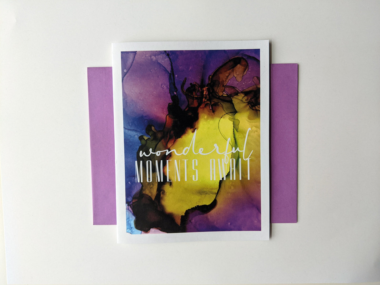 Greeting card with a colorful envelope on white background.