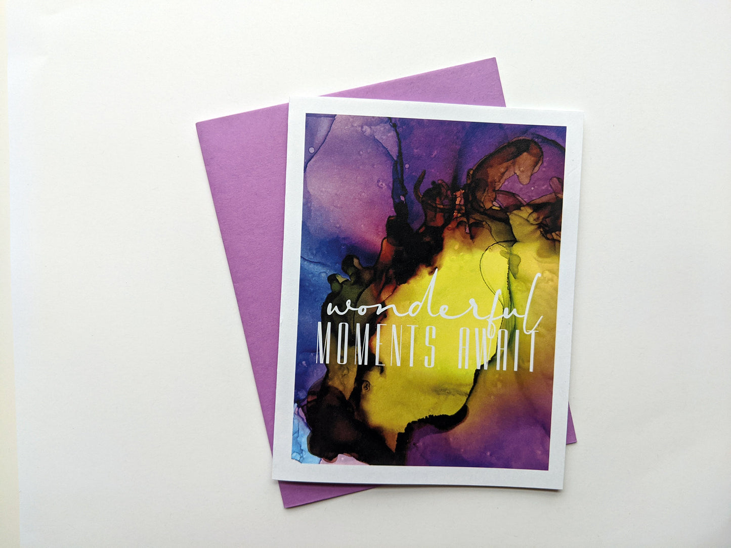 Greeting card with a colorful envelope on white background.