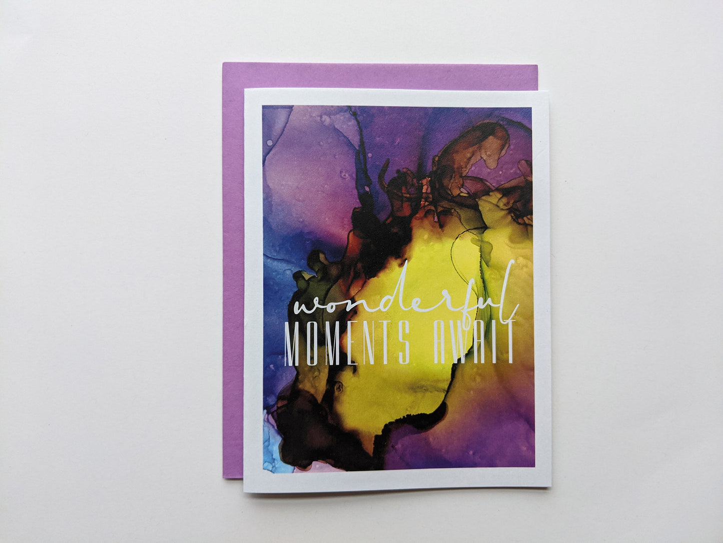 Greeting card with a colorful envelope on white background.