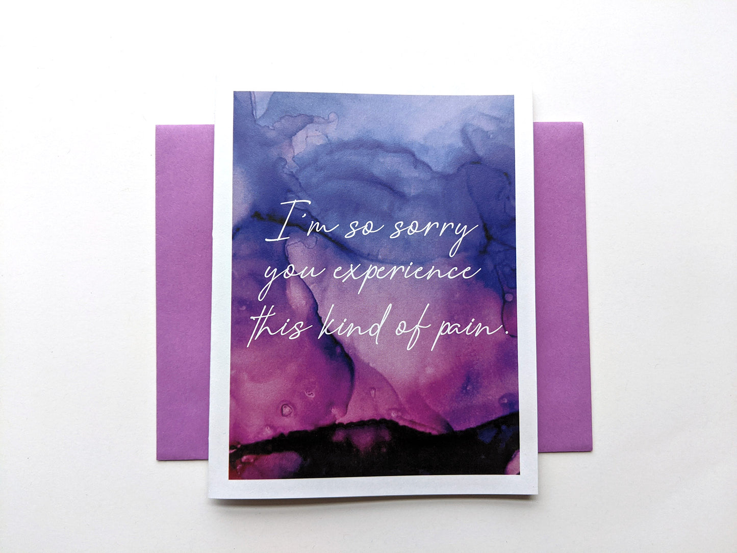Greeting card with a colorful envelope on white background.