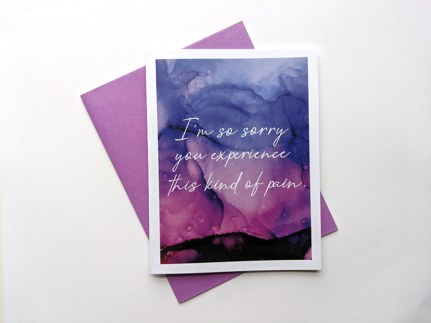 Greeting card with a colorful envelope on white background.