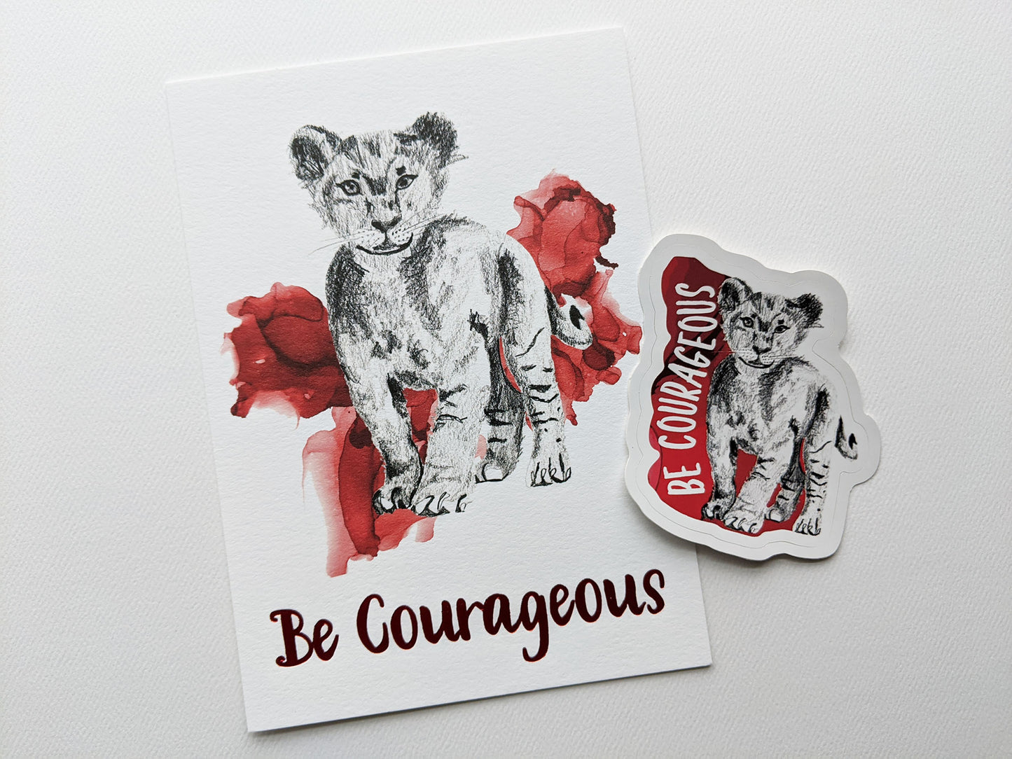 Art print and sticker on a white background.