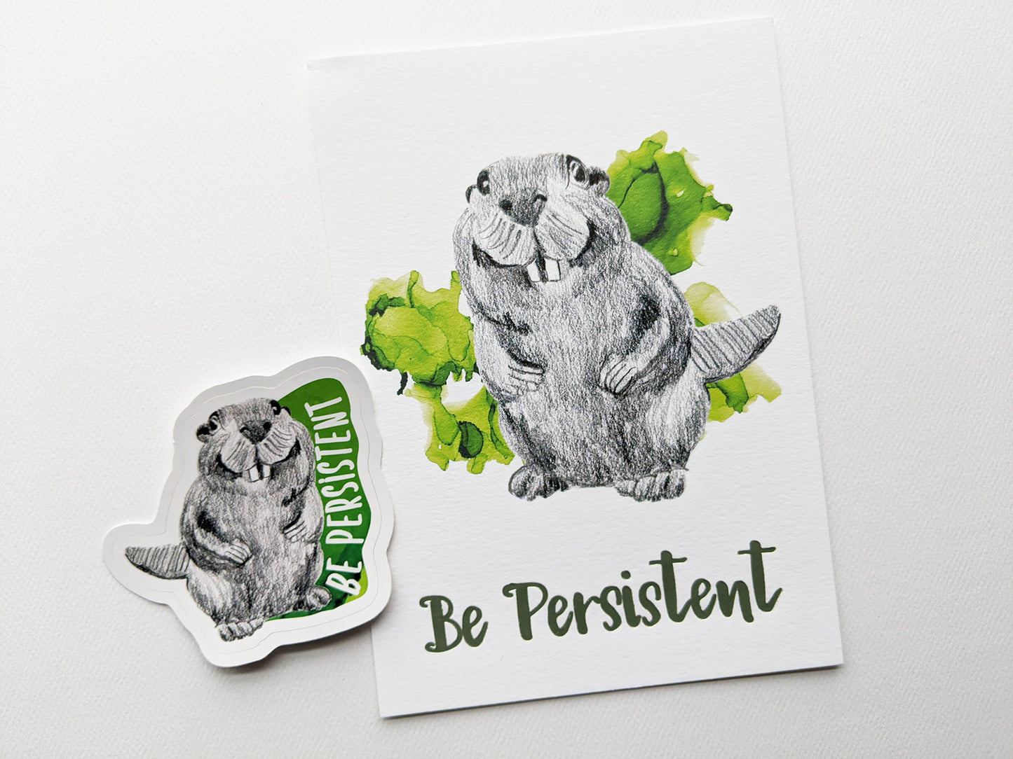Art print and sticker on a white background.