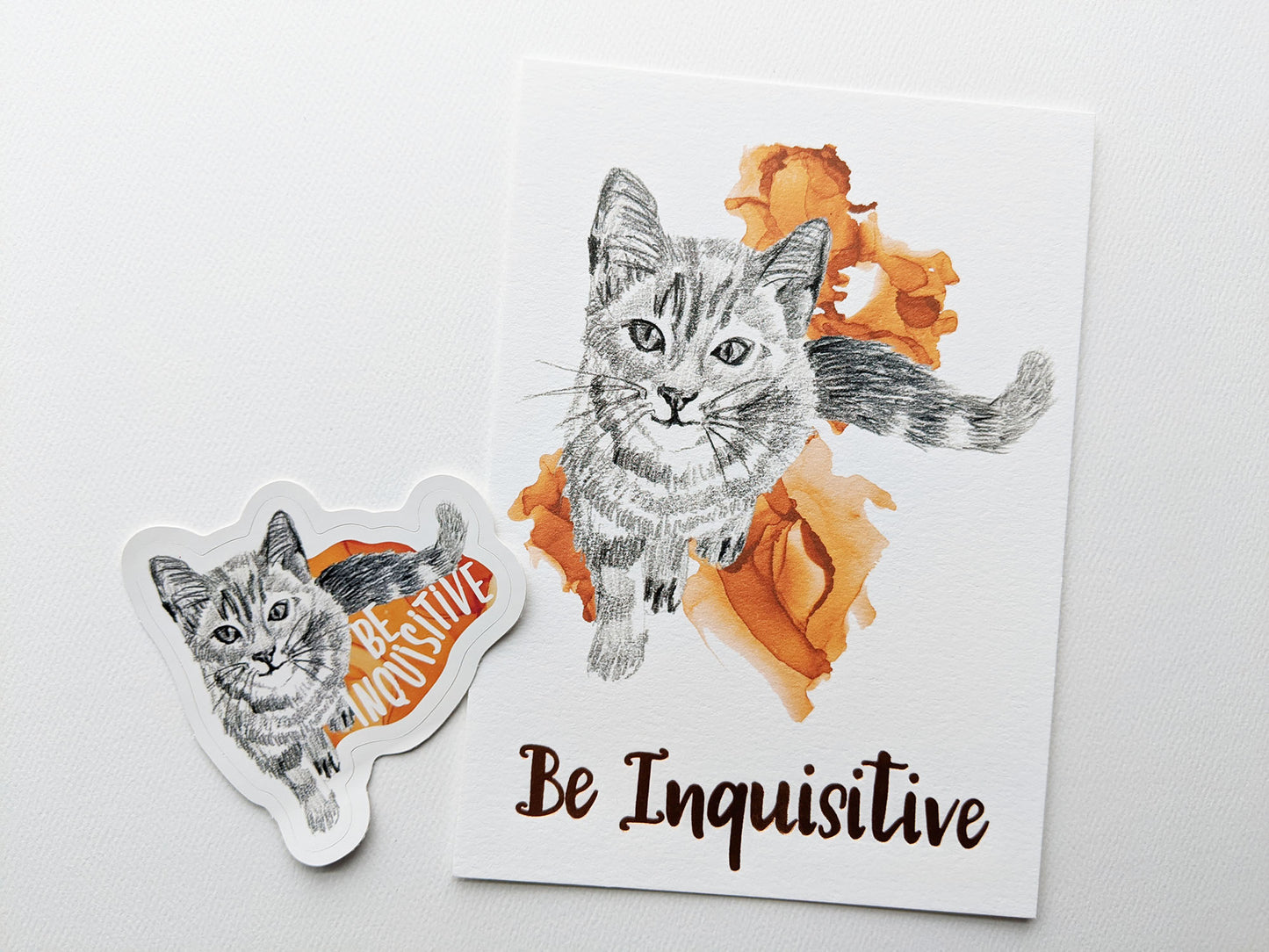 Art print and sticker on a white background.