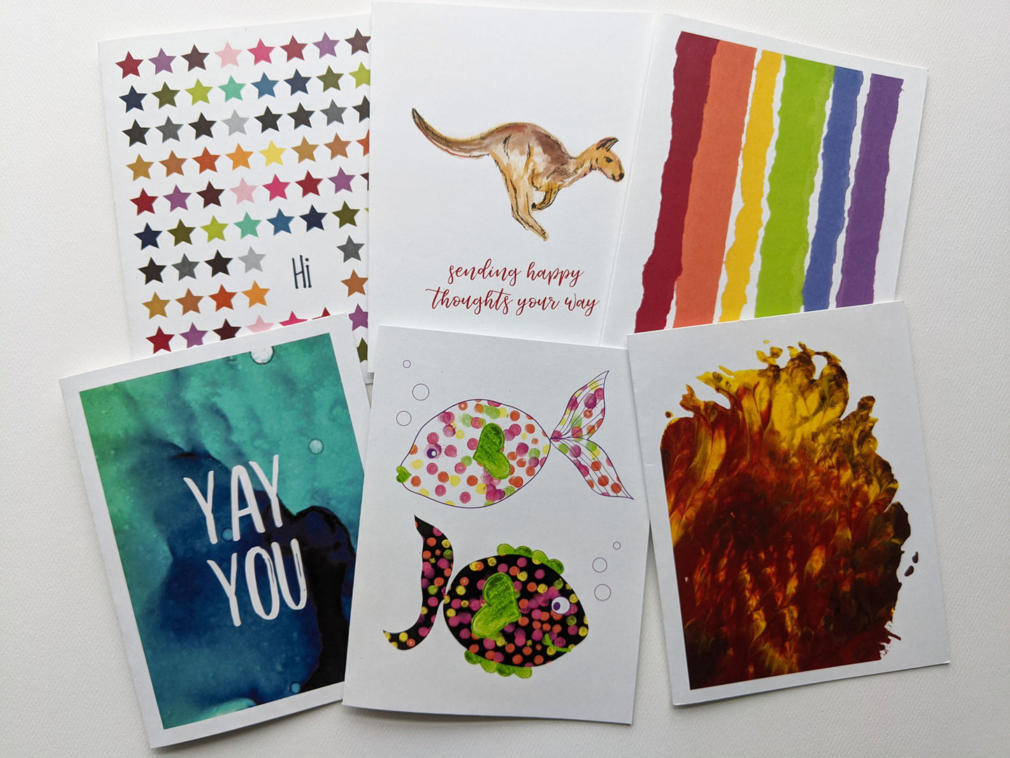 Six greeting cards in overlapping 2x3 grid.