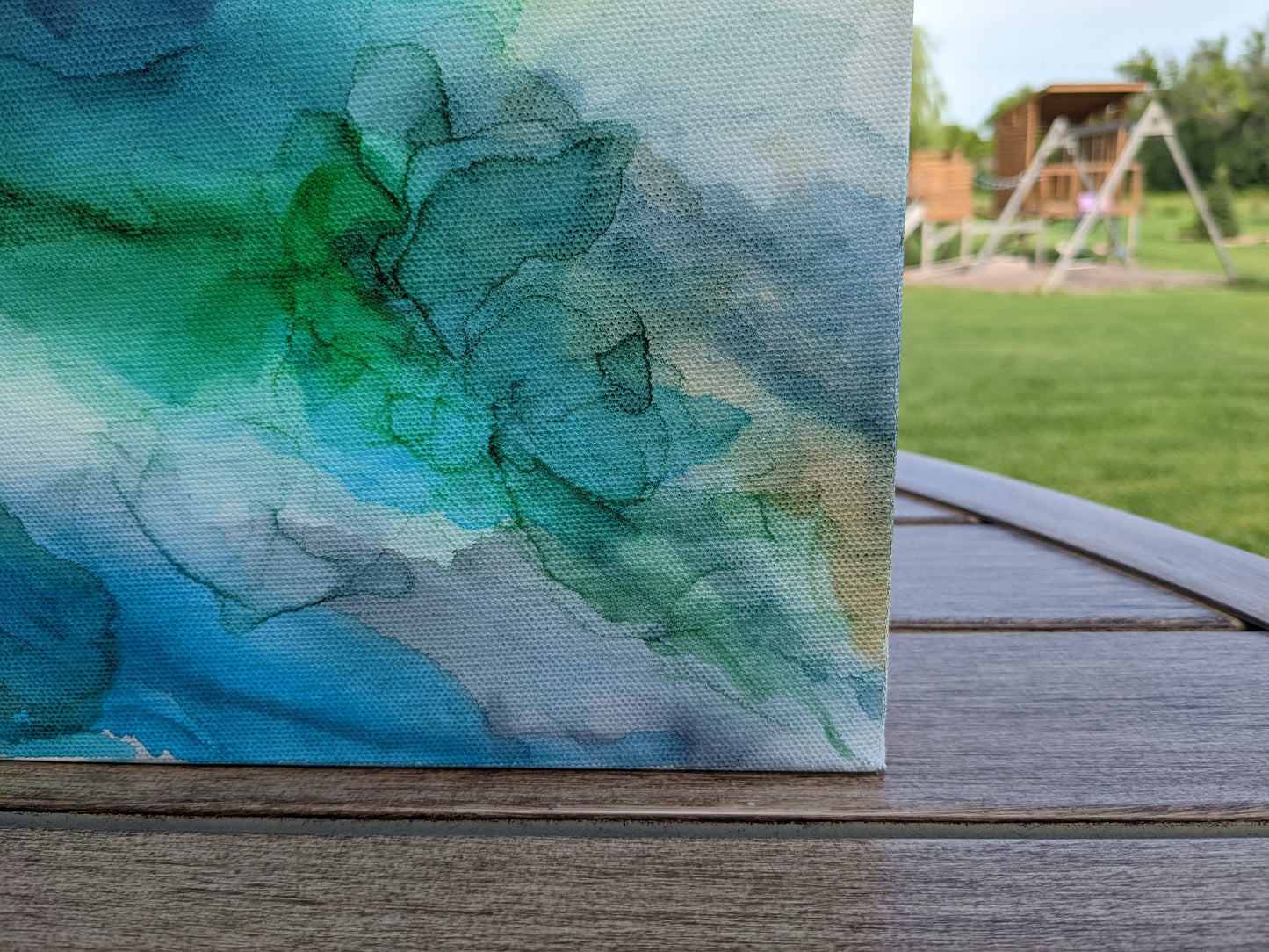 Zoomed in detail of painting outdoors.