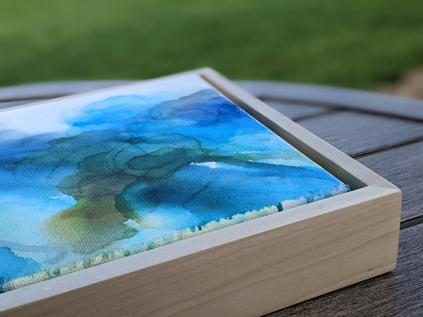 Zoomed in detail of painting outdoors.