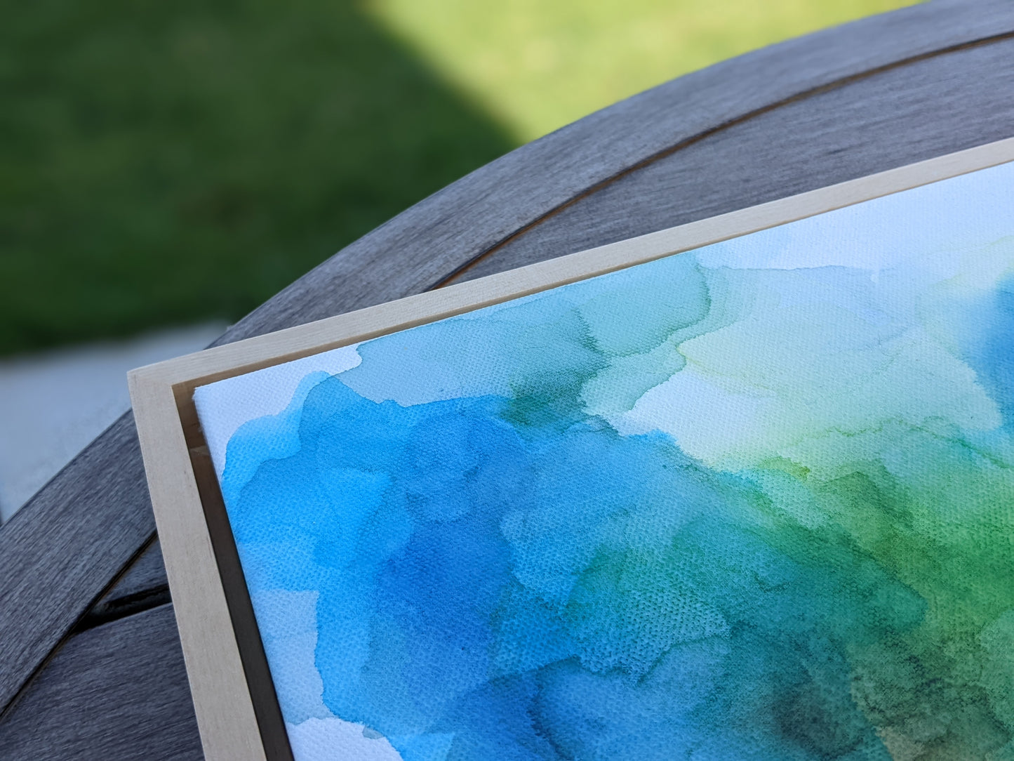 Zoomed in detail of painting outdoors.