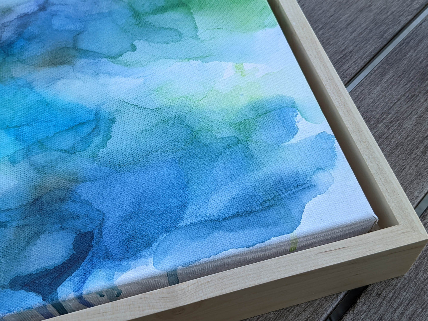 Zoomed in detail of painting outdoors.