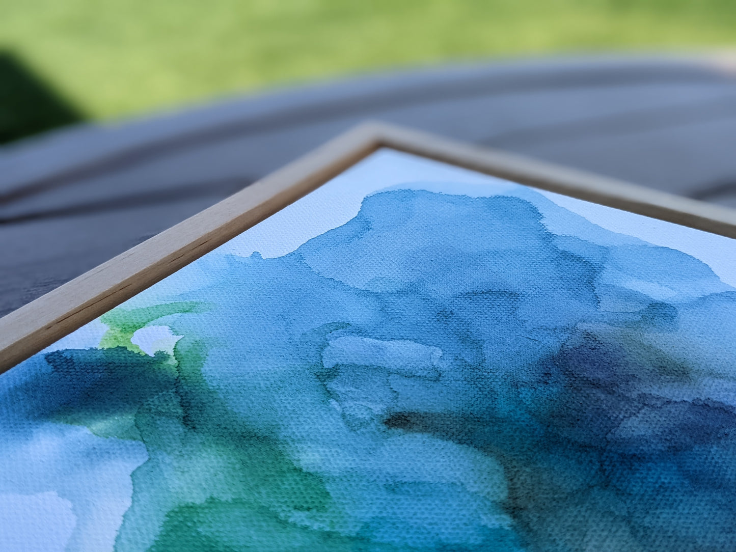 Zoomed in detail of painting outdoors.