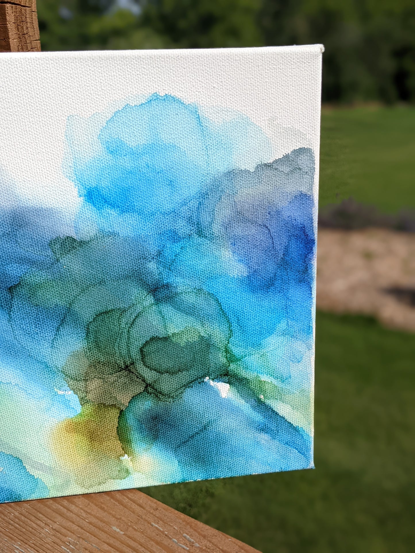 Zoomed in detail of painting outdoors.