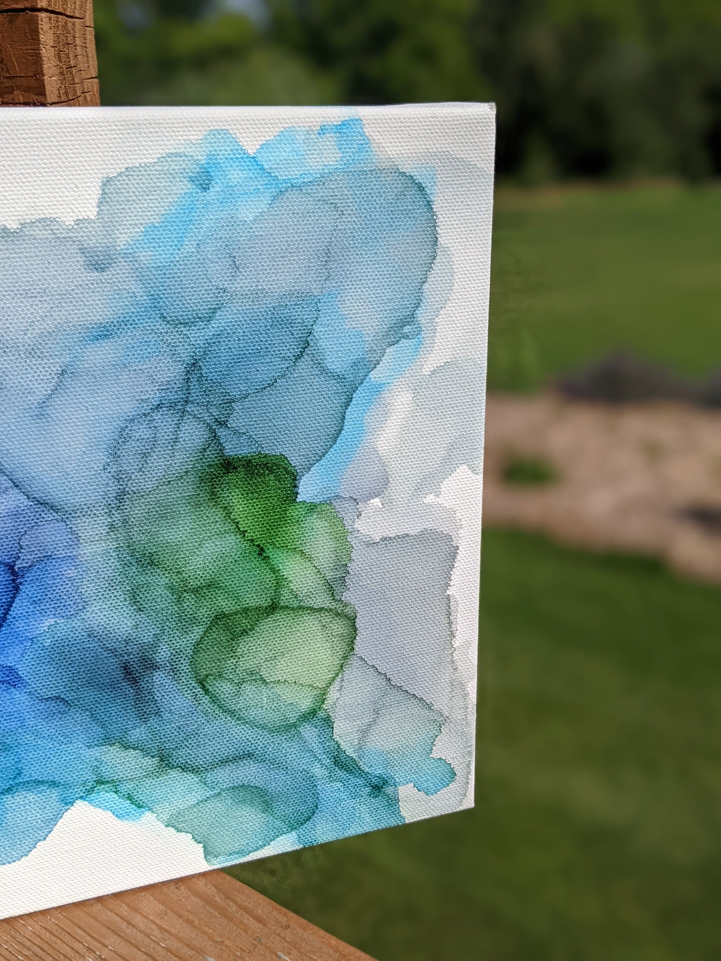 Zoomed in detail of painting outdoors.