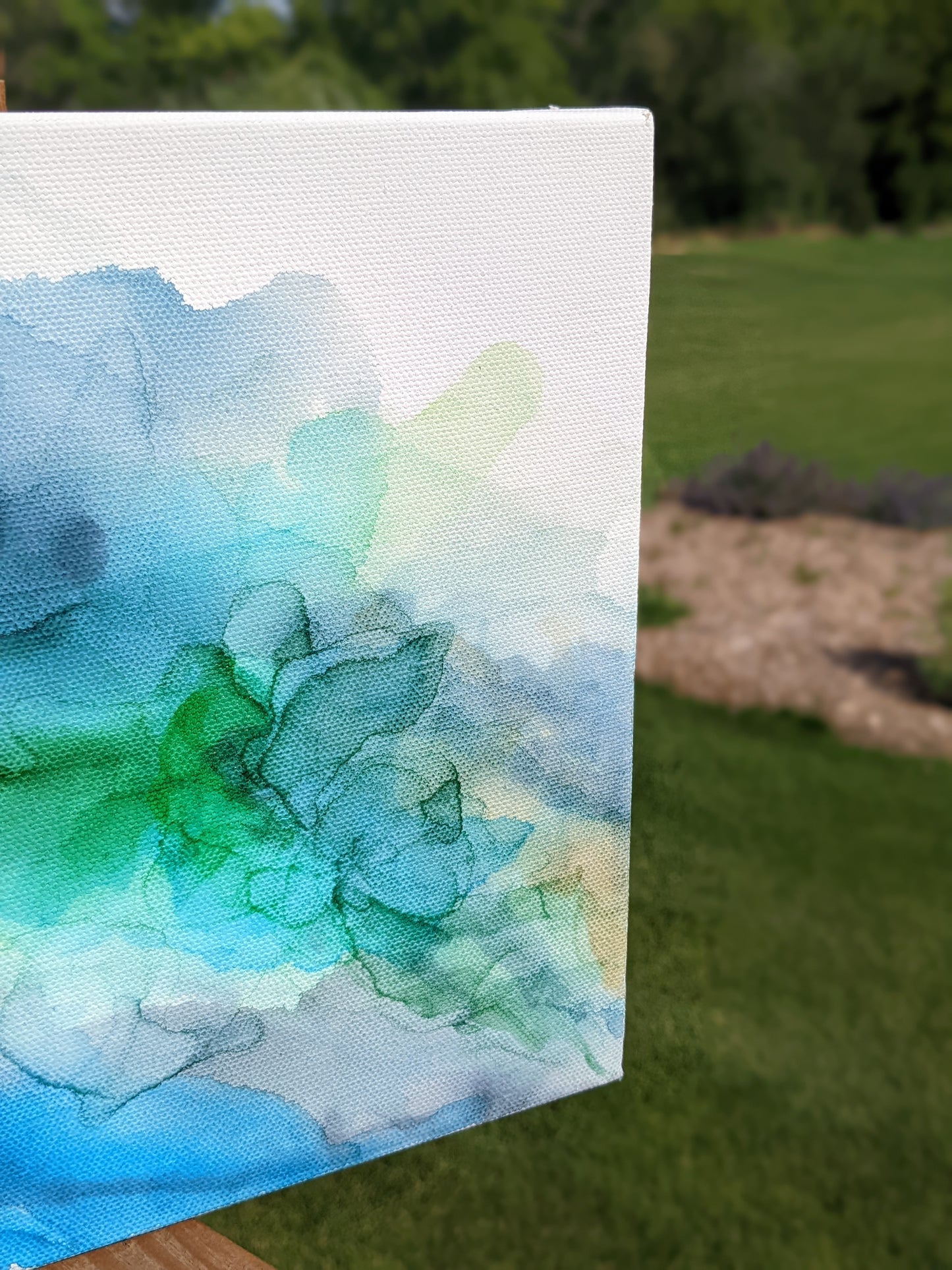 Zoomed in detail of painting outdoors.
