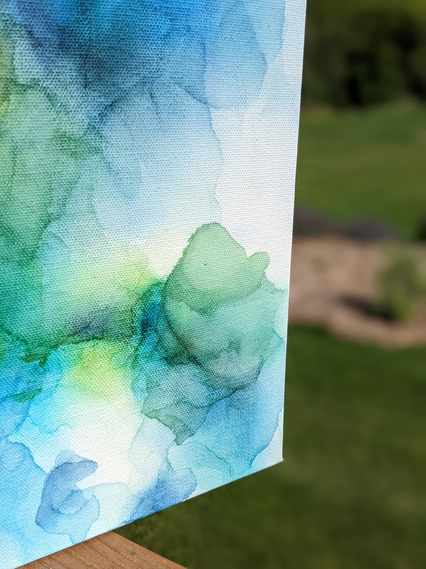 Zoomed in detail of painting outdoors.