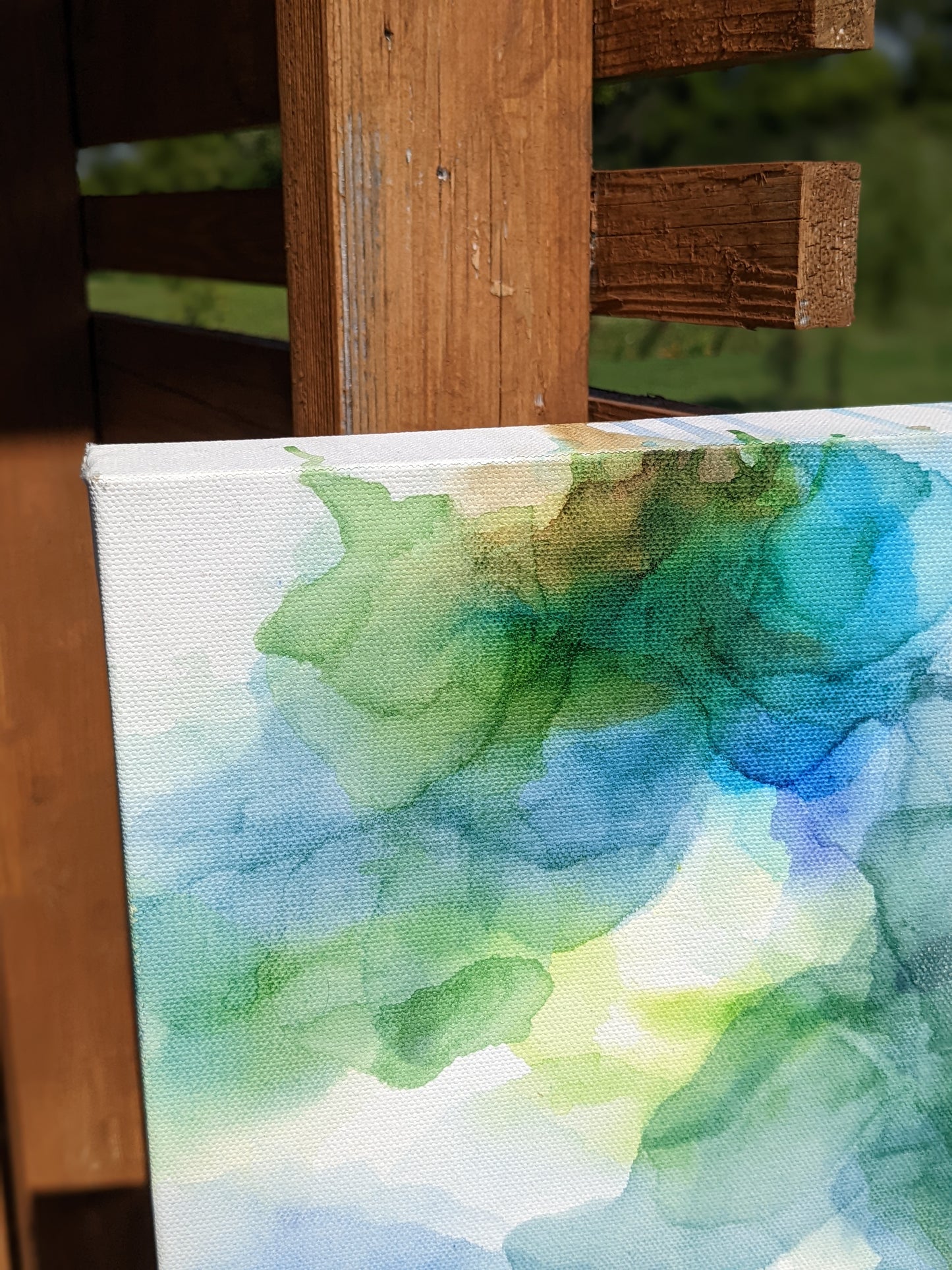 Zoomed in detail of painting outdoors.