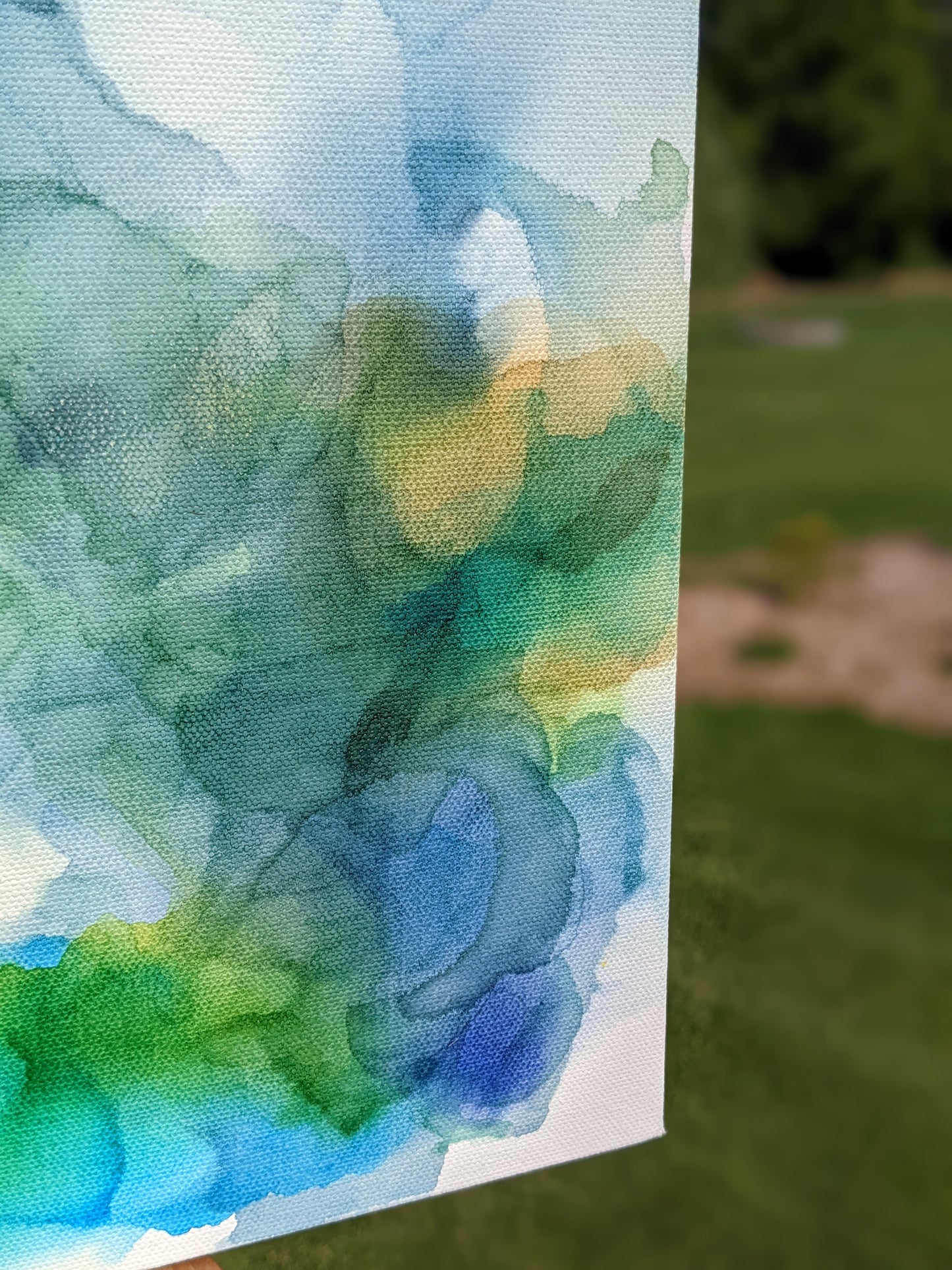 Zoomed in detail of painting outdoors.