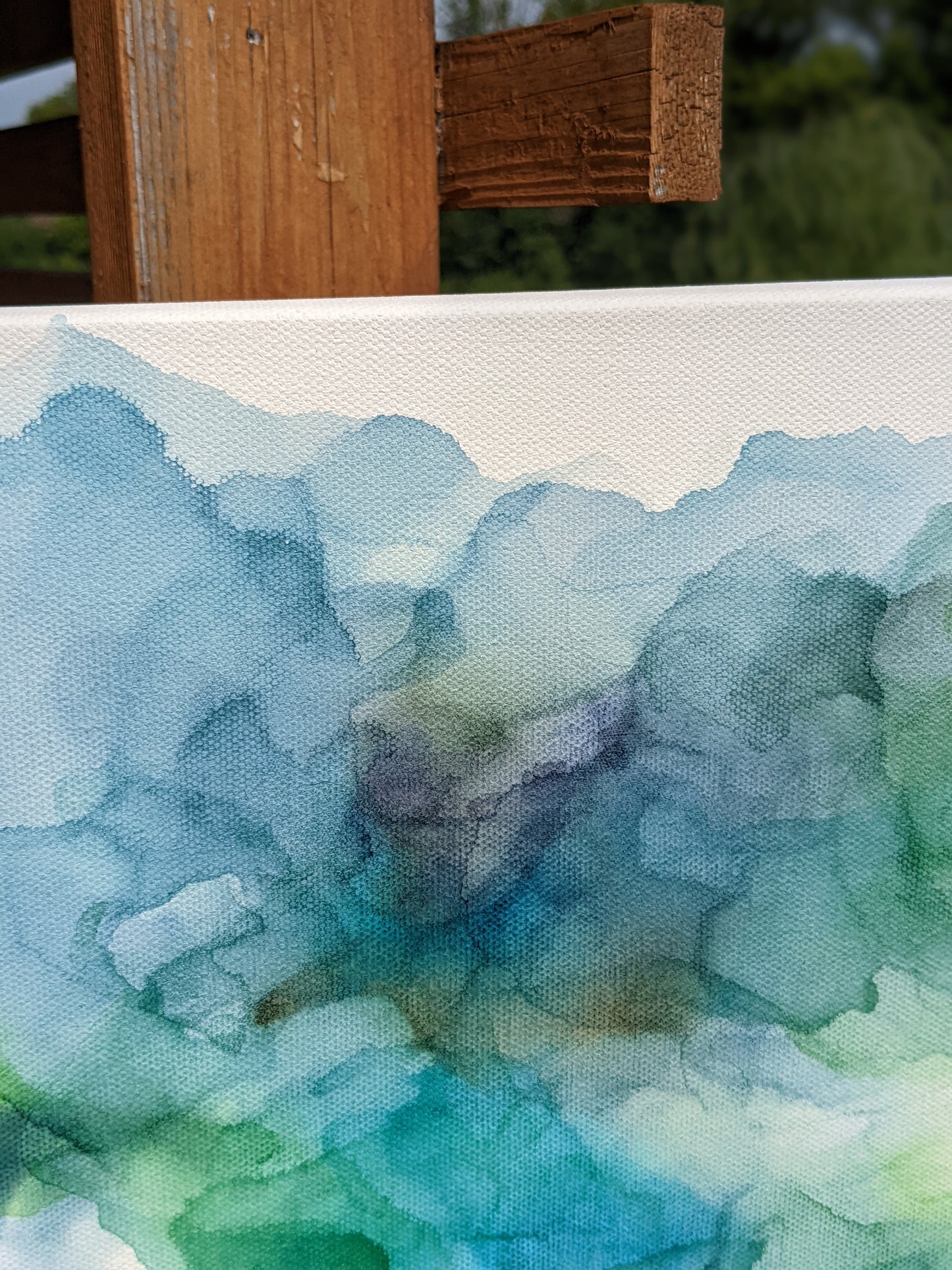 Zoomed in detail of painting outdoors.