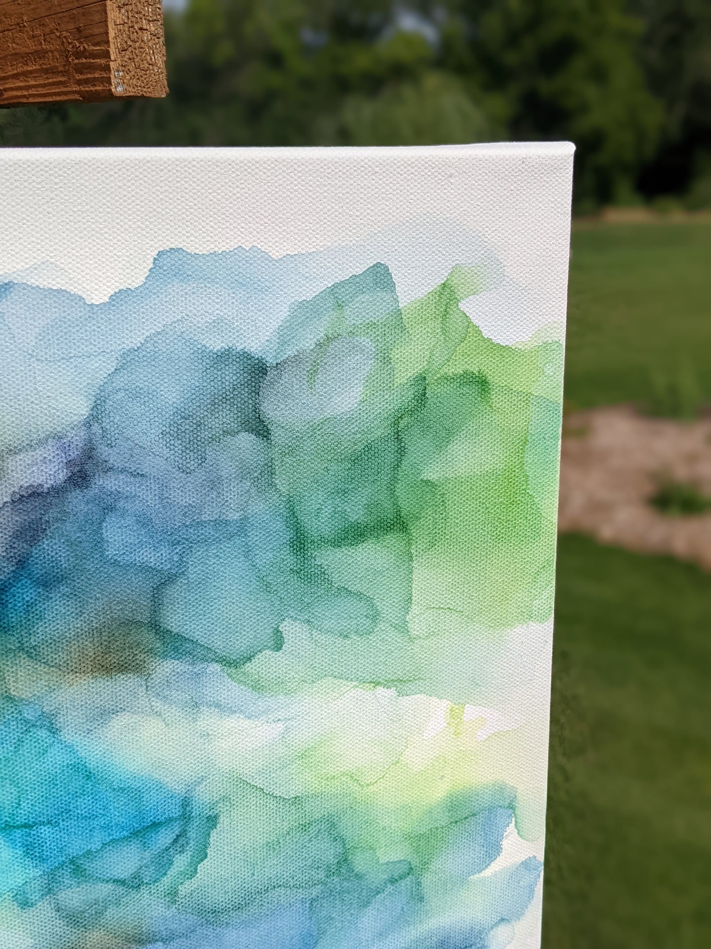 Zoomed in detail of painting outdoors.